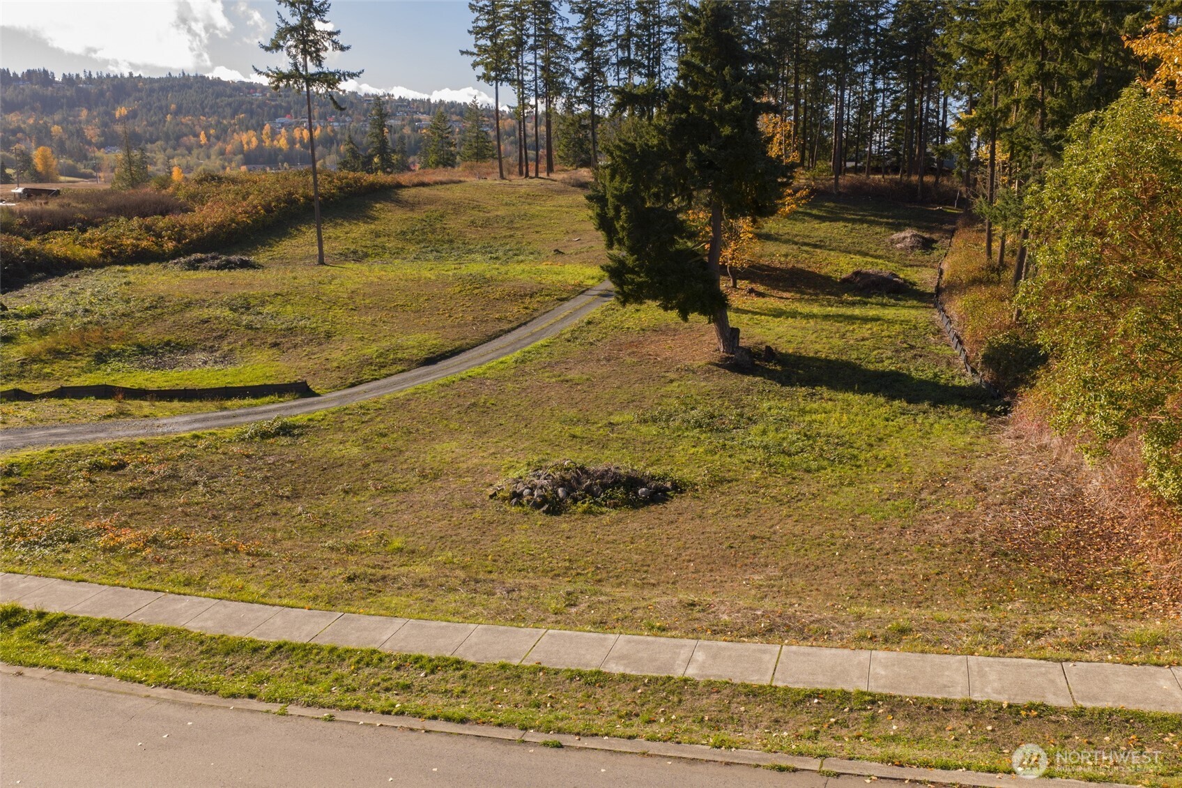 391 Keeler Road Sequim, WA 98382 - Photo 7 of 25 a view of a yard with an ocean view