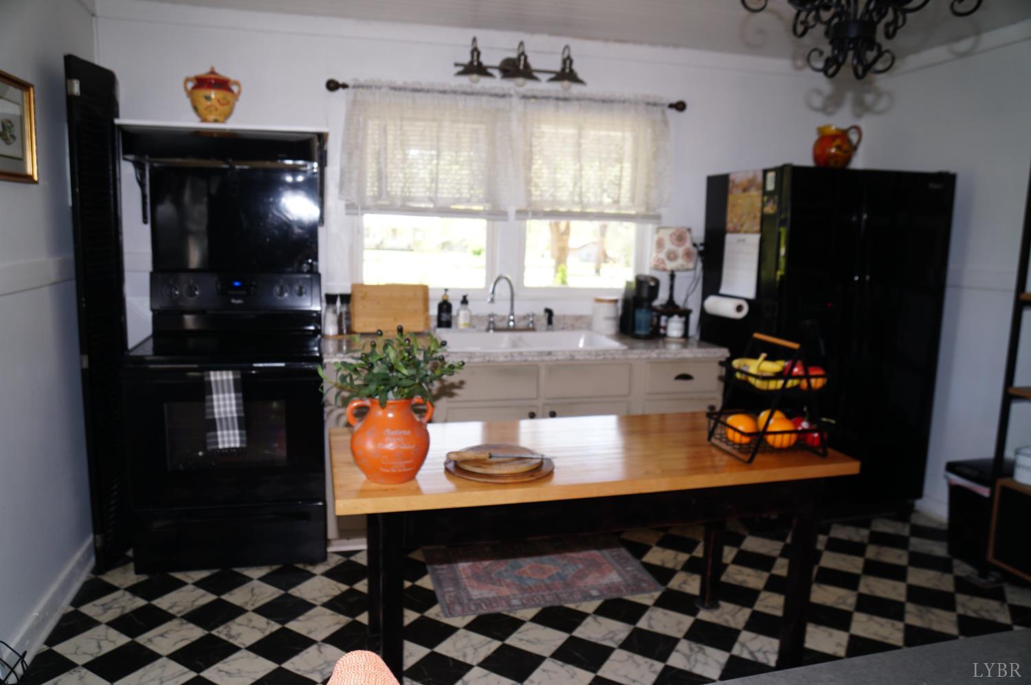 10188 Stage Coach Road Gretna, VA 24557 - Photo 11 of 56 a room with furniture and window