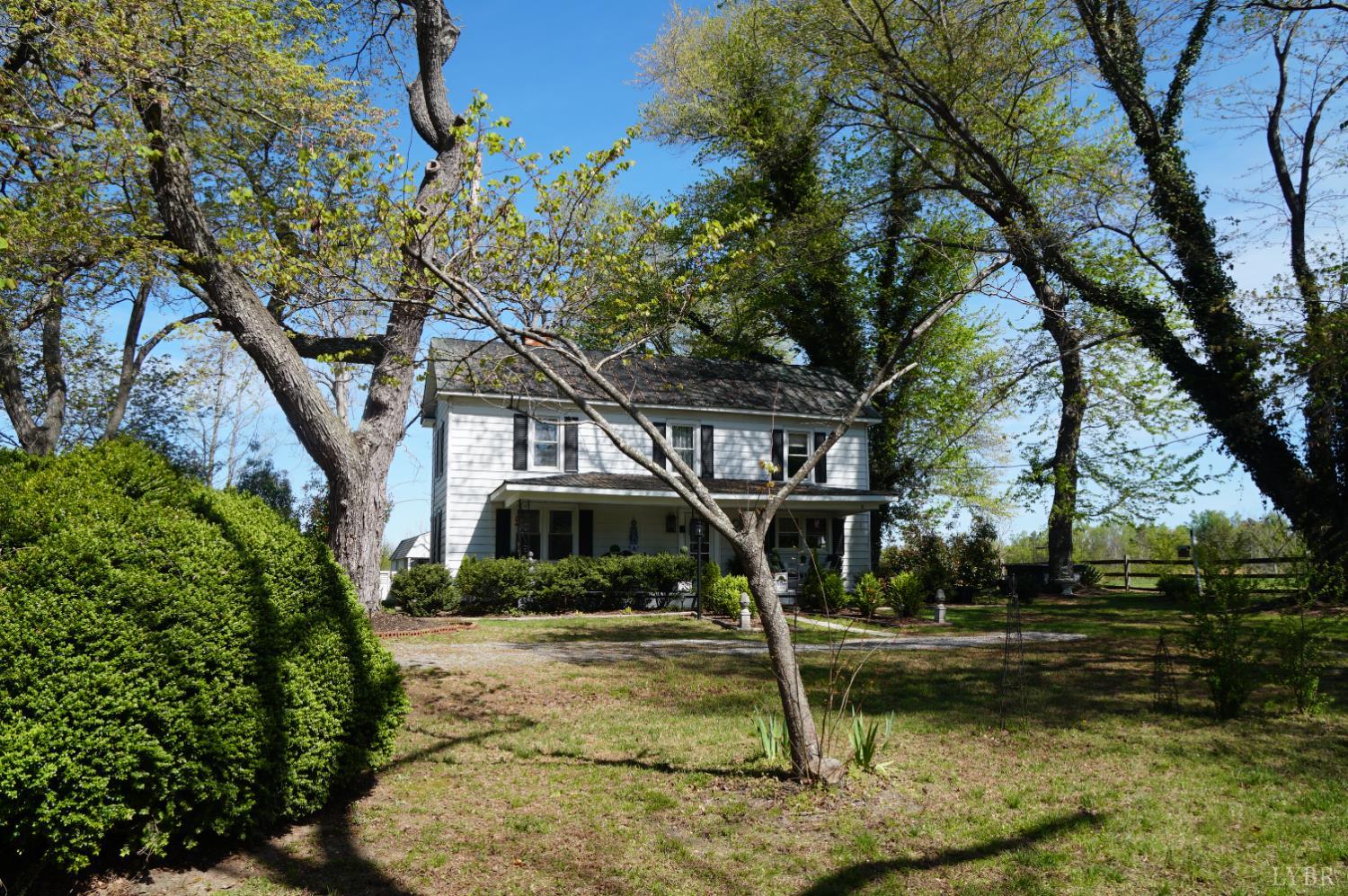10188 Stage Coach Road Gretna, VA 24557 - Photo 31 of 56 a view of a house with a yard