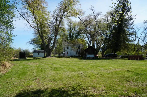 a view of backyard with green space