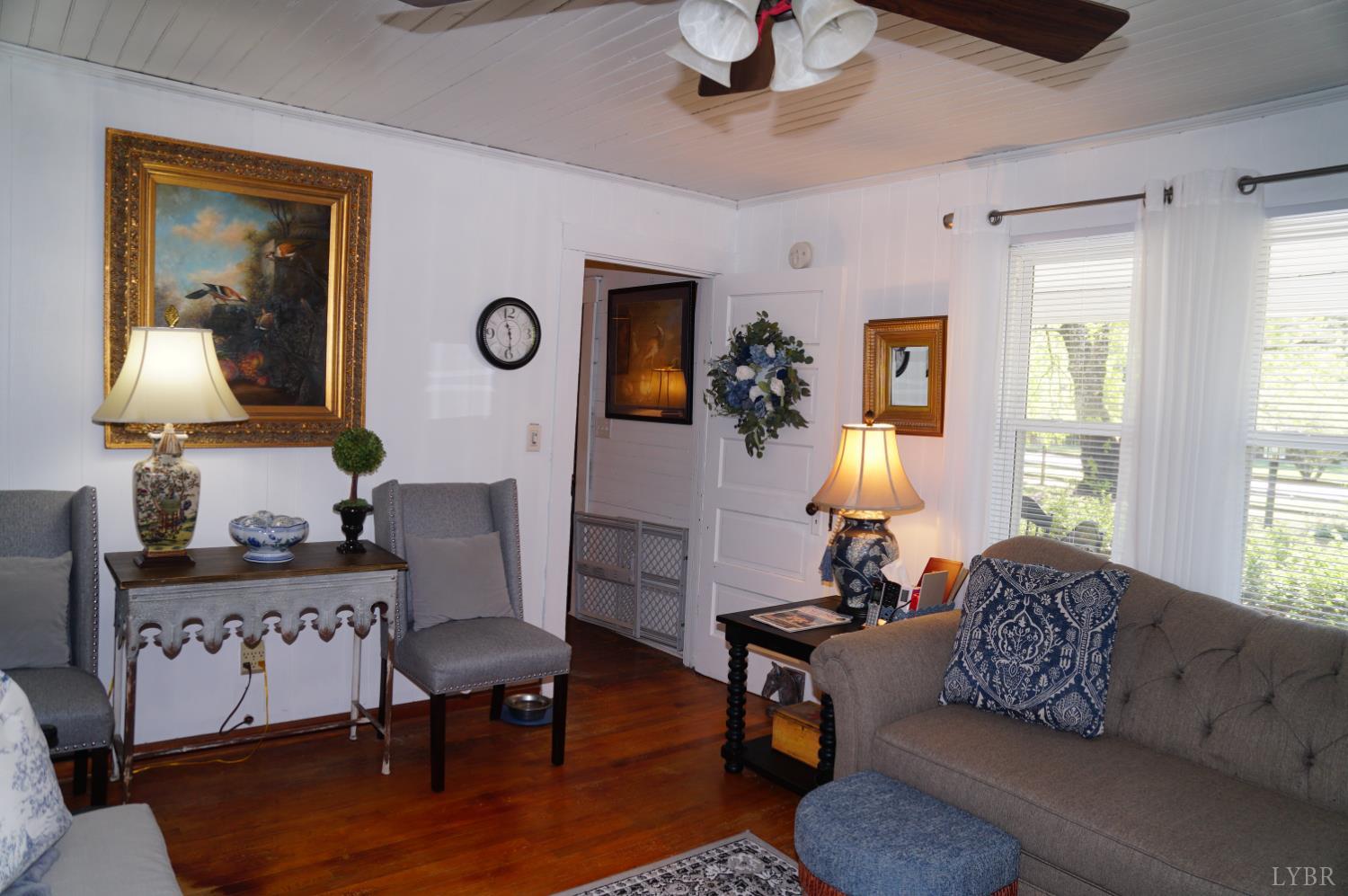 10188 Stage Coach Road Gretna, VA 24557 - Photo 5 of 56 a living room with furniture and a window