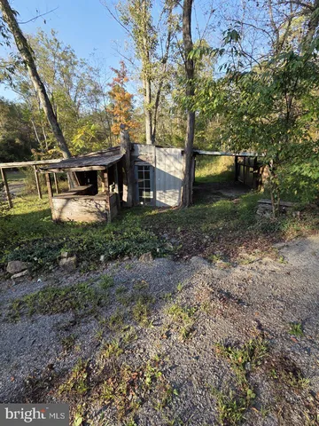 a view of house with outdoor space