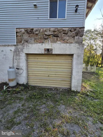 a view of a backyard of the house