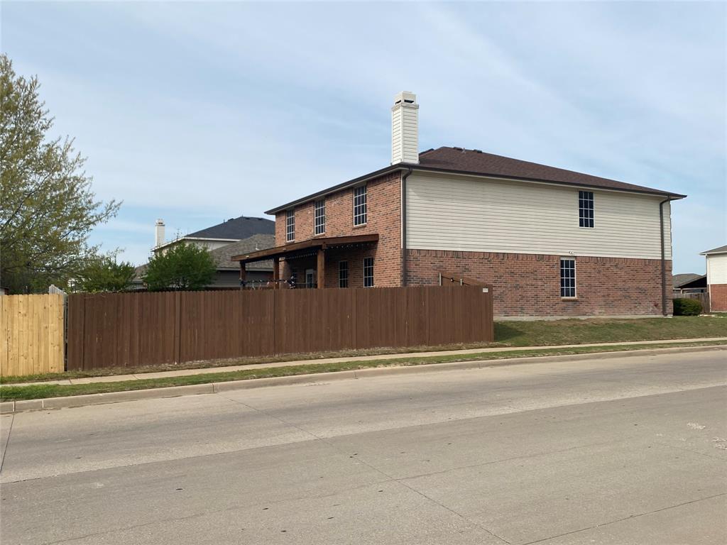 5301 Temecula Road Fort Worth, TX 76244 - Photo 7 of 7 a front view of a house with a fence