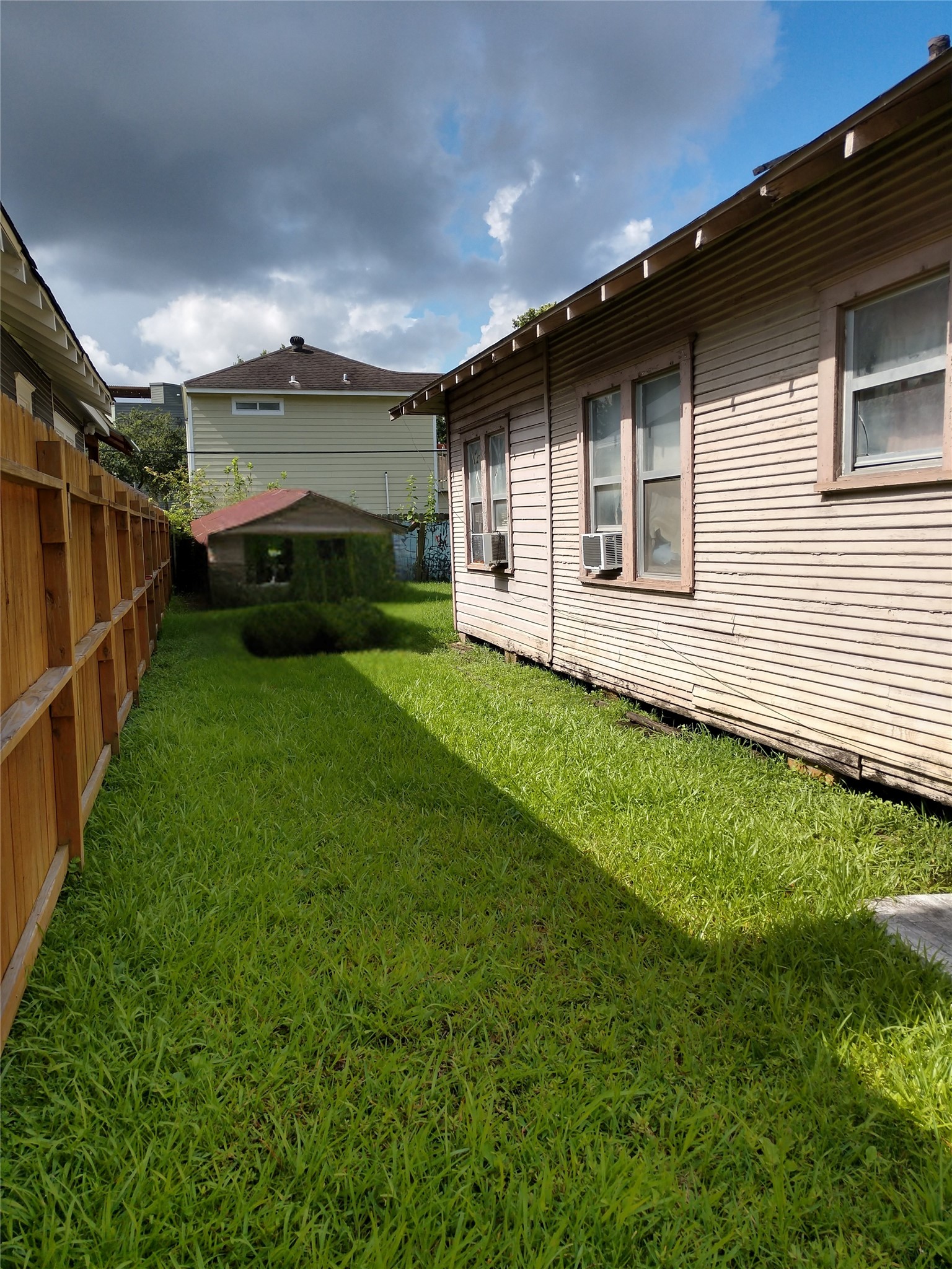1102 Usener Street Houston, TX 77009 - Photo 4 of 6 a front view of house with yard and green space