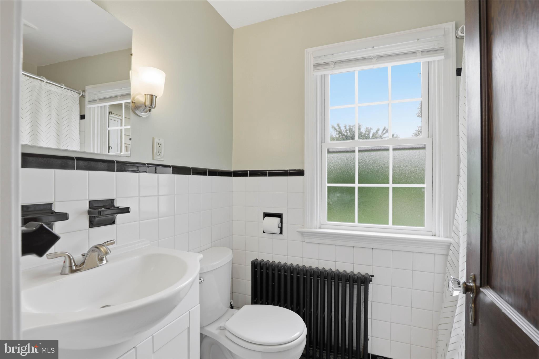 169 School House Road Lancaster, PA 17603 - Photo 23 of 39 a bathroom with a sink toilet and mirror