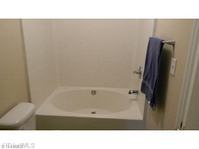 7004 Tree Hollow Road Thomasville, NC 27360 - Photo 14 of 16 Bath. 2nd Bath for guest rooms offers an over sized tub.
