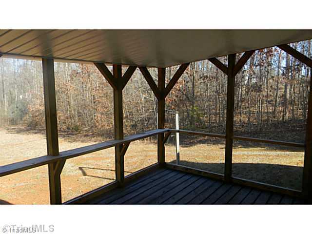 7004 Tree Hollow Road Thomasville, NC 27360 - Photo 16 of 16 Screened Porch. Great outside room for Spring/Summer/Fall entertainment.