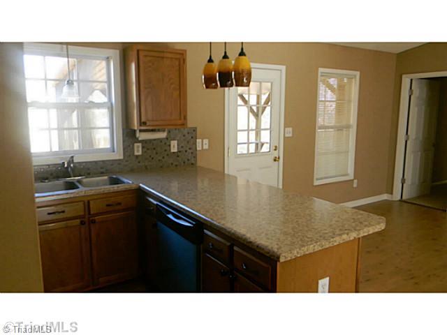 7004 Tree Hollow Road Thomasville, NC 27360 - Photo 4 of 16 Dining Room. Kitchen to dining area