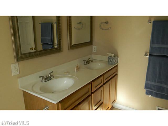 7004 Tree Hollow Road Thomasville, NC 27360 - Photo 10 of 16 Master Bath/Spa. With double Vanity.
