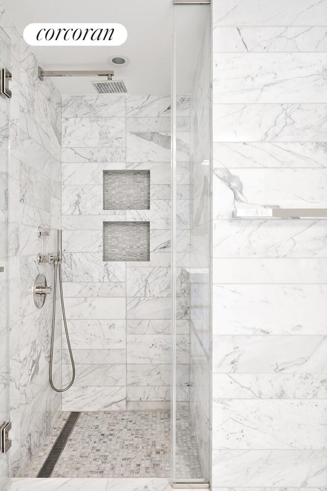 135 West 52nd Street, Unit 31B Manhattan, NY 10019 - Photo 8 of 9 a bathroom with a shower