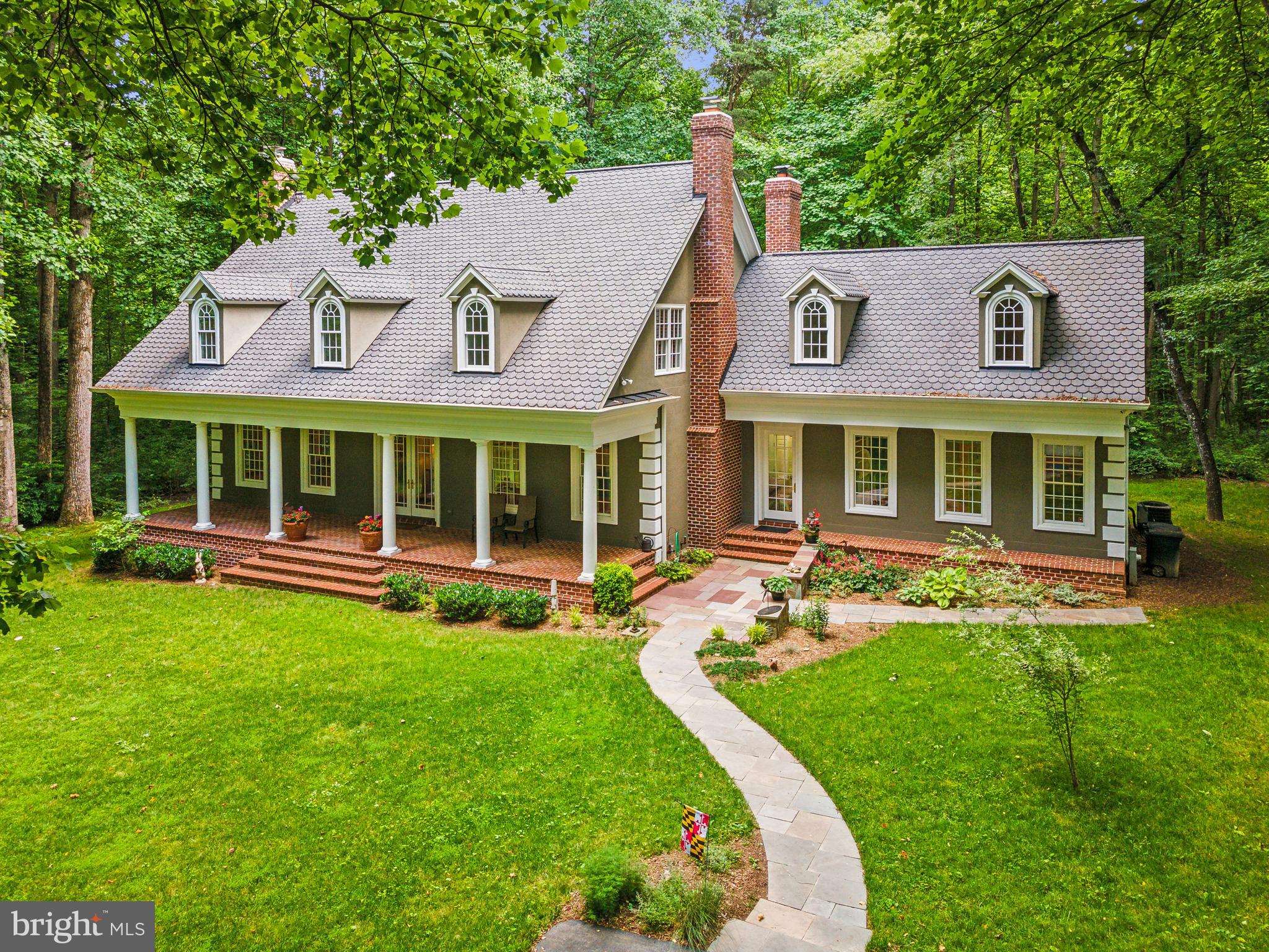8683 Reservoir Road Fulton, MD 20759 - Photo 1 of 60 a view of a house with a yard and sitting area