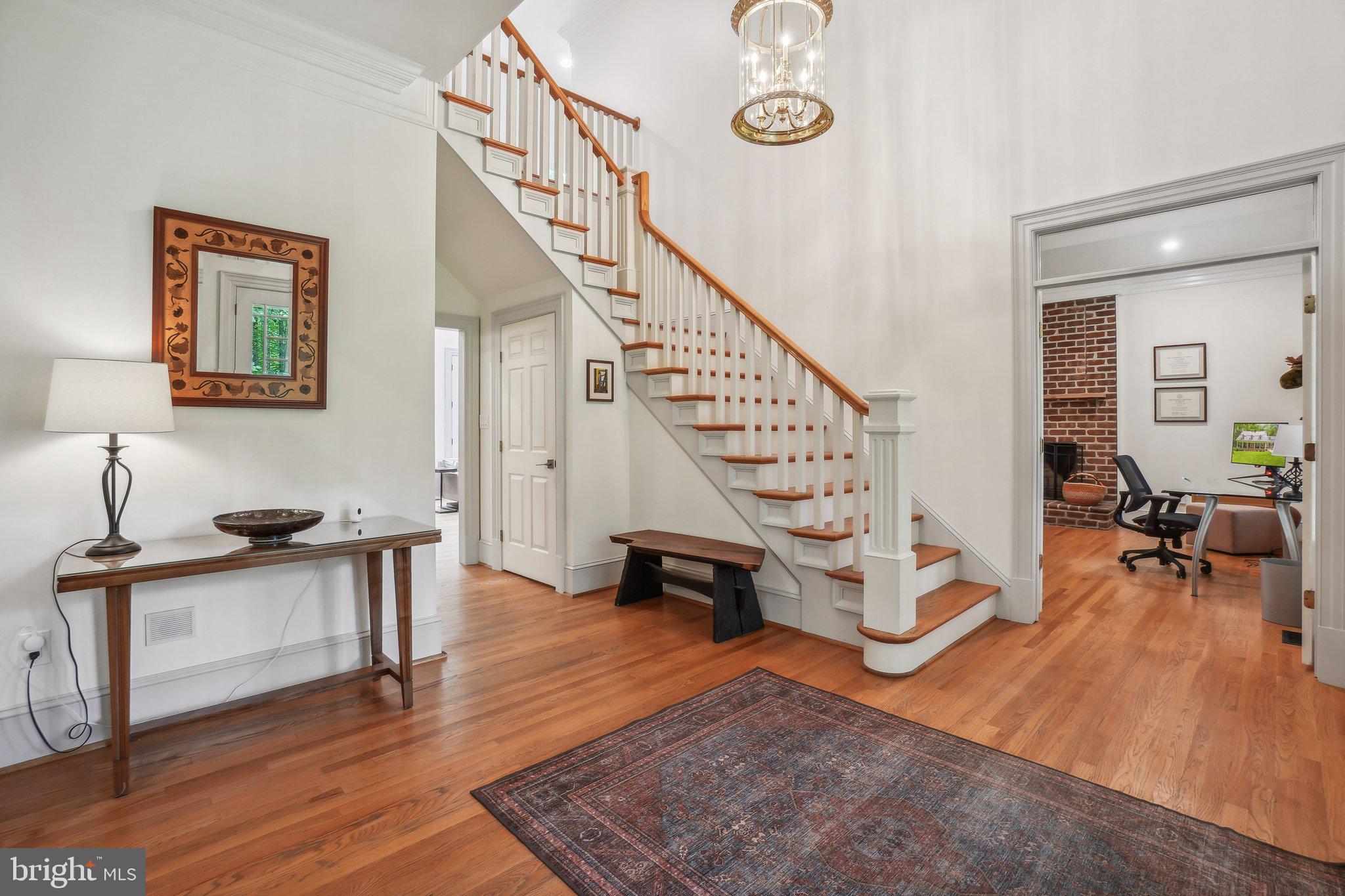 8683 Reservoir Road Fulton, MD 20759 - Photo 11 of 60 a view of entryway and hall with wooden floor