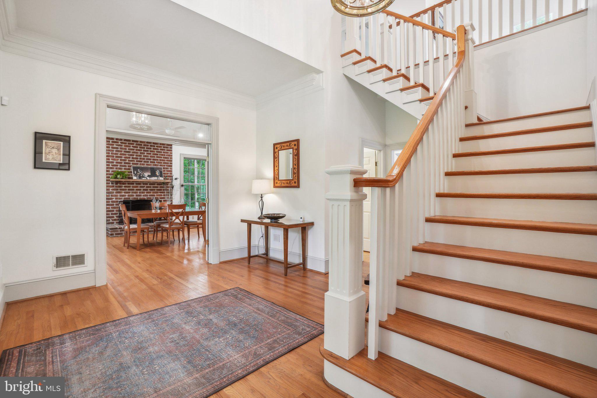 8683 Reservoir Road Fulton, MD 20759 - Photo 12 of 60 a view of entryway and hall with wooden floor