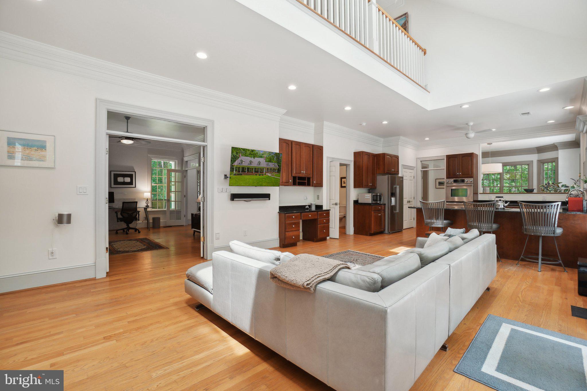 8683 Reservoir Road Fulton, MD 20759 - Photo 15 of 60 a living room with fireplace furniture and a wooden floor