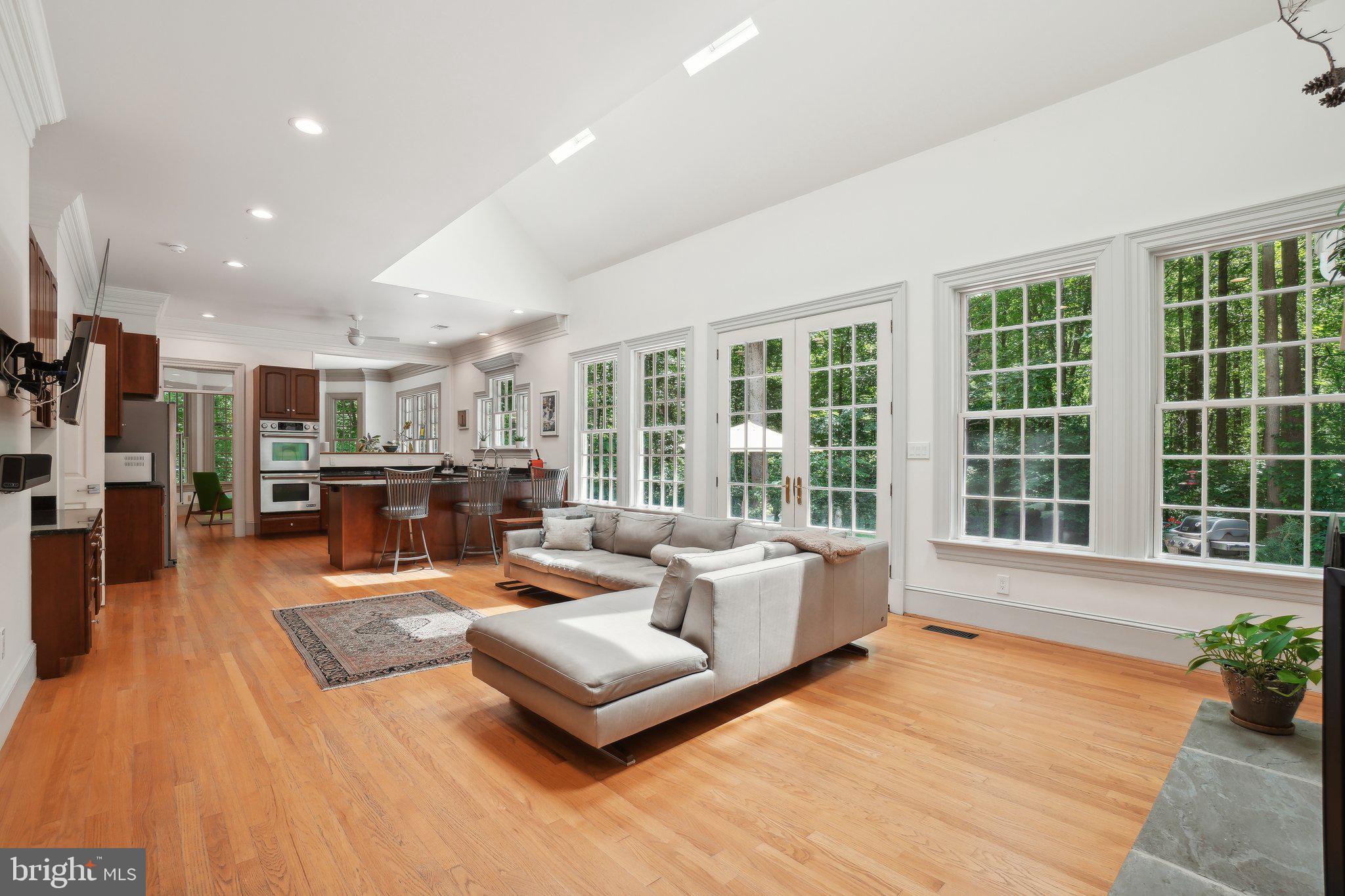 8683 Reservoir Road Fulton, MD 20759 - Photo 16 of 60 a living room with furniture and a large window