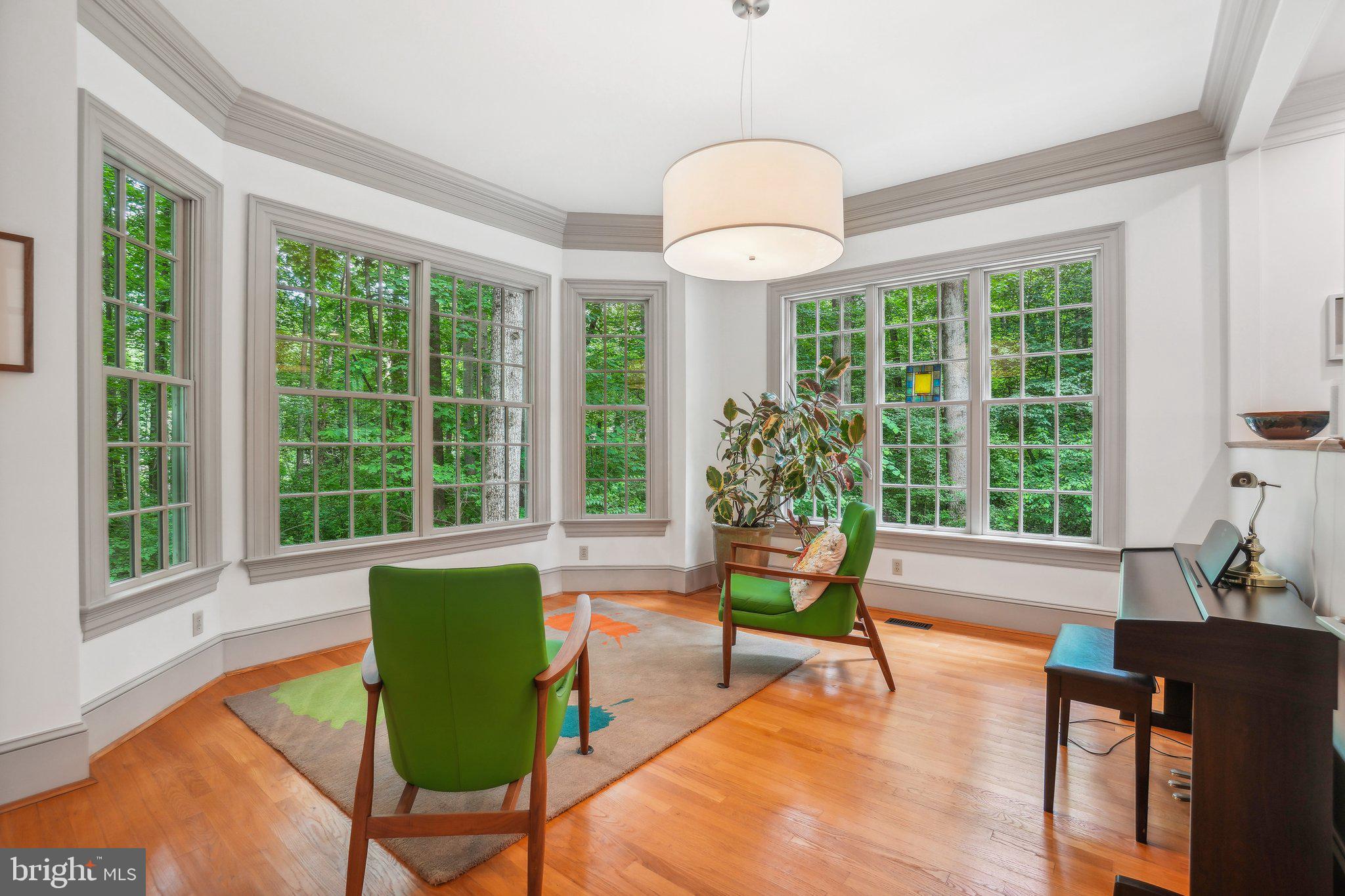 8683 Reservoir Road Fulton, MD 20759 - Photo 23 of 60 a living room filled with furniture and a large window