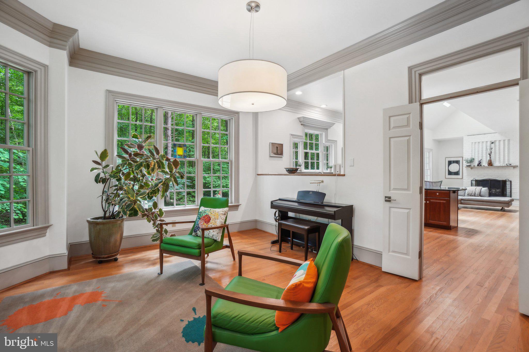 8683 Reservoir Road Fulton, MD 20759 - Photo 24 of 60 a living room with furniture and a large window