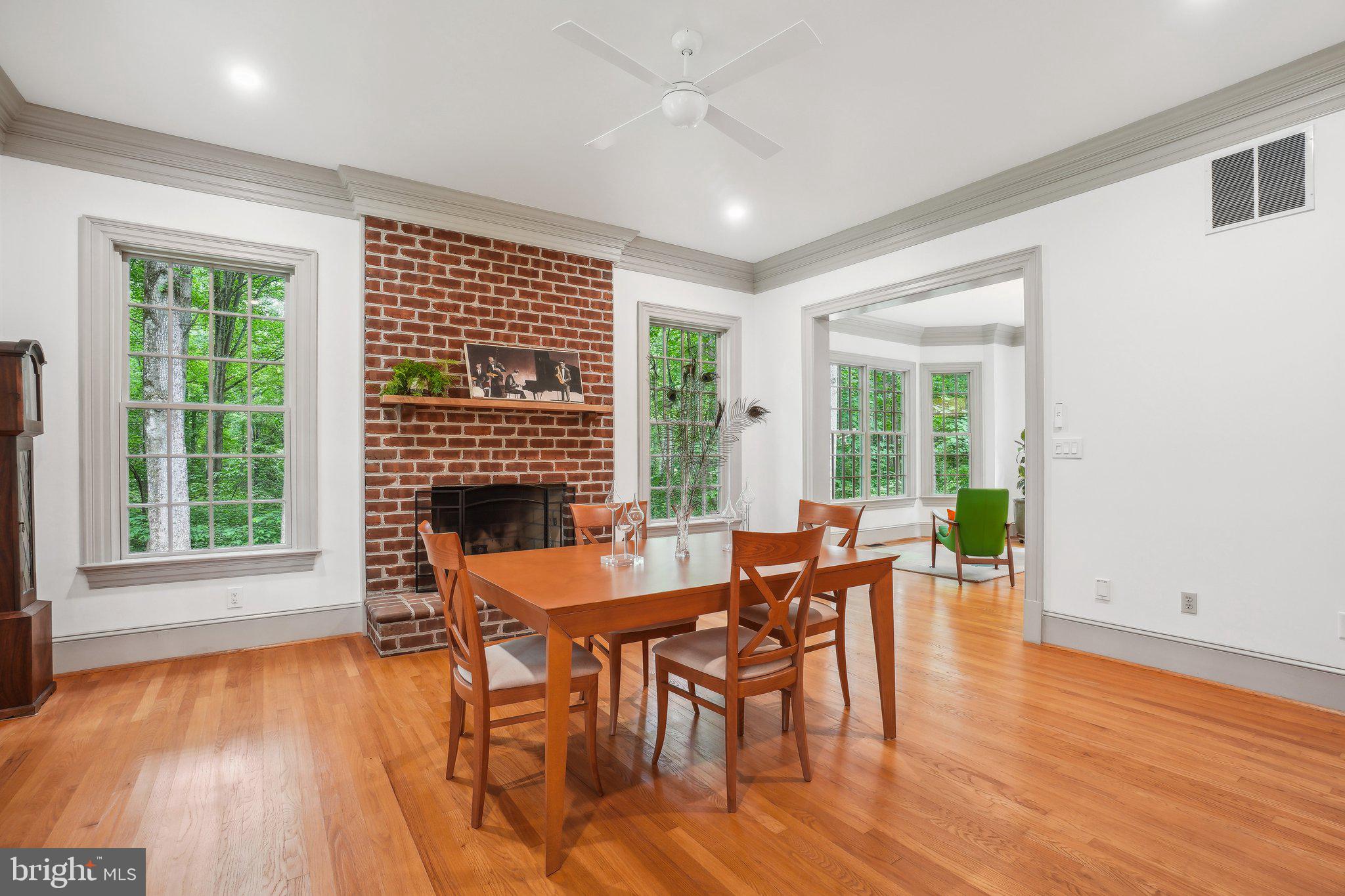 8683 Reservoir Road Fulton, MD 20759 - Photo 27 of 60 a view of a dining room with furniture window and wooden floor