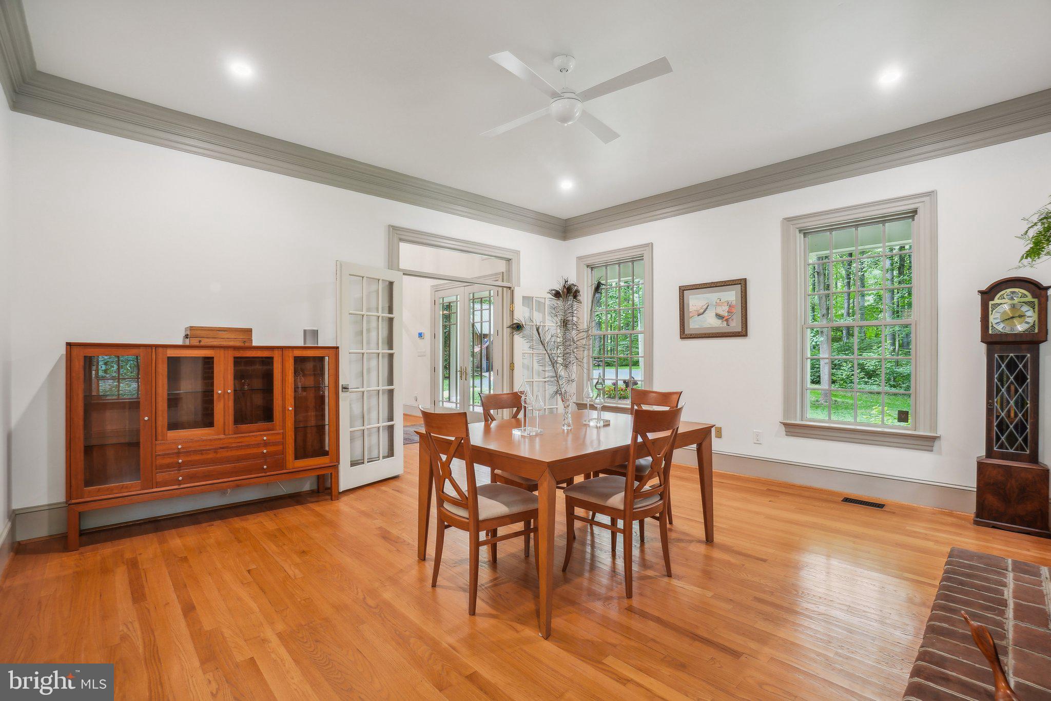 8683 Reservoir Road Fulton, MD 20759 - Photo 28 of 60 a view of a dining room with furniture window and wooden floor