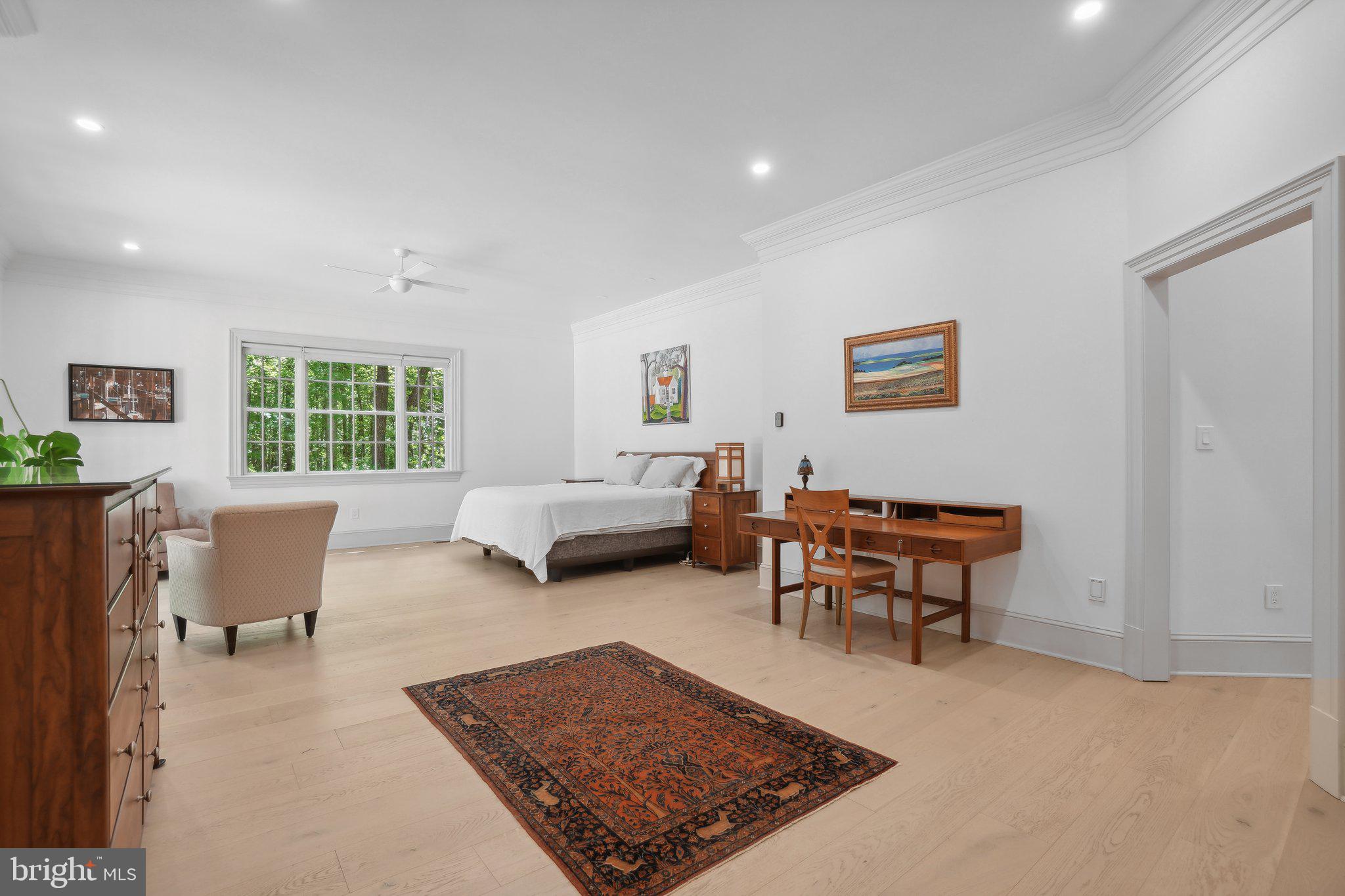 8683 Reservoir Road Fulton, MD 20759 - Photo 29 of 60 a living room with furniture a rug and a window