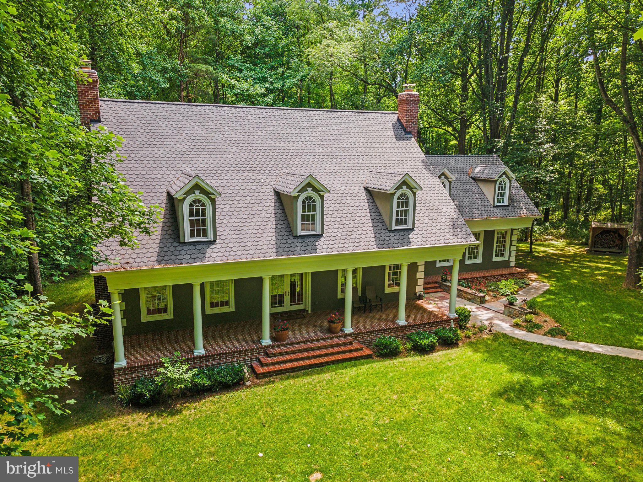 8683 Reservoir Road Fulton, MD 20759 - Photo 3 of 60 front view of a house with a yard