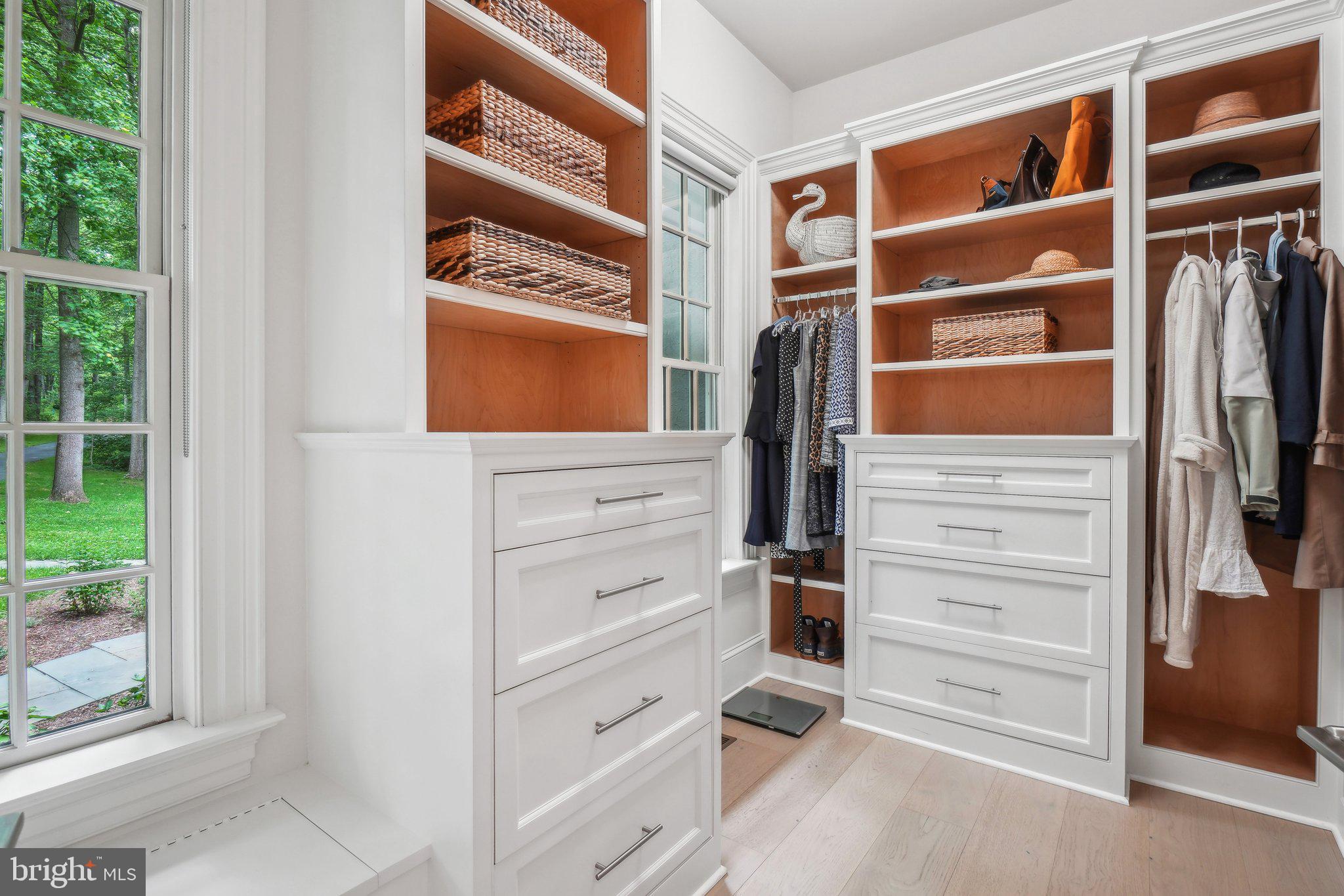 8683 Reservoir Road Fulton, MD 20759 - Photo 34 of 60 a view of walk in closet with clothes