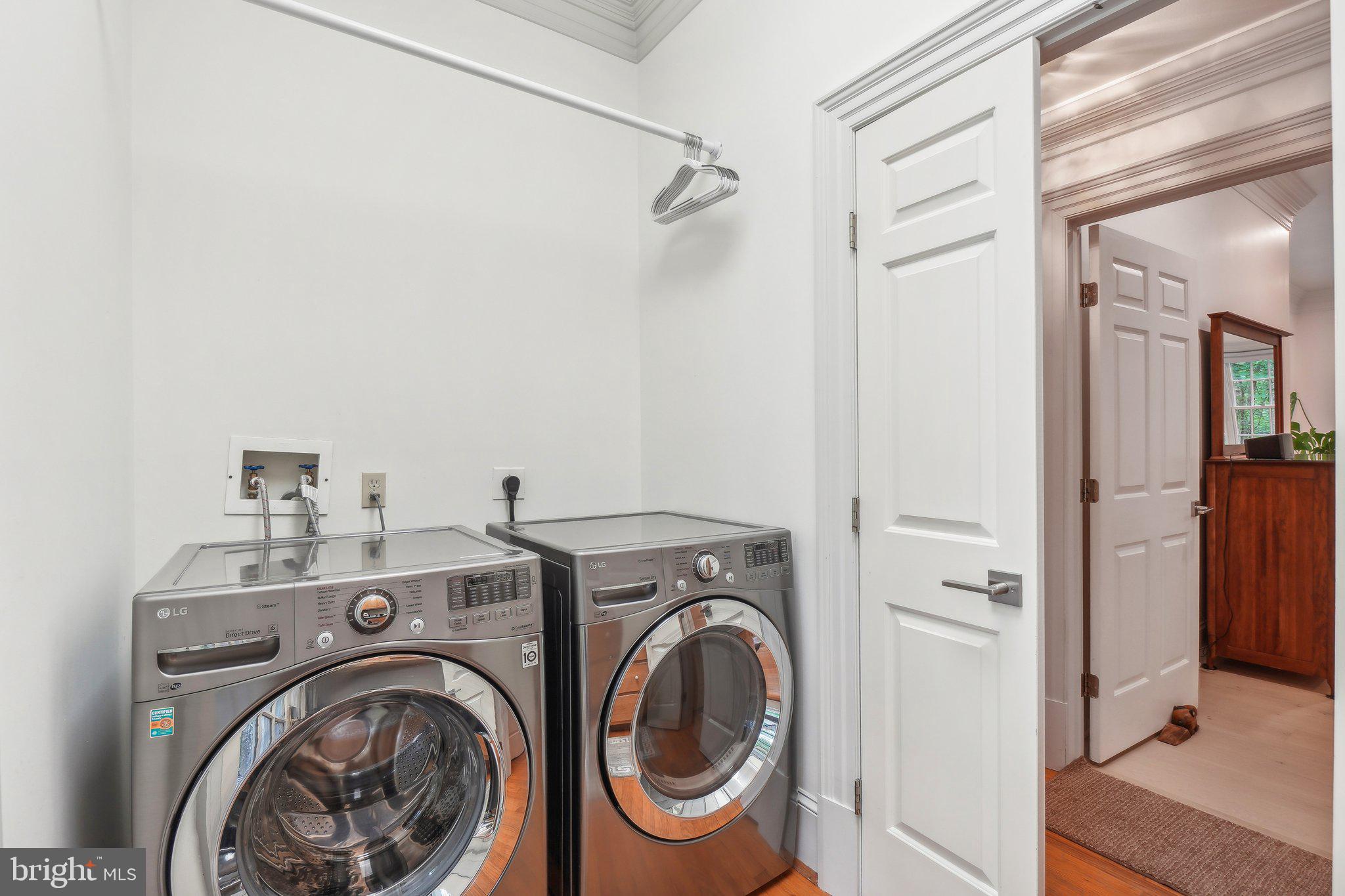 8683 Reservoir Road Fulton, MD 20759 - Photo 60 of 60 a view of a hallway with washer and dryer