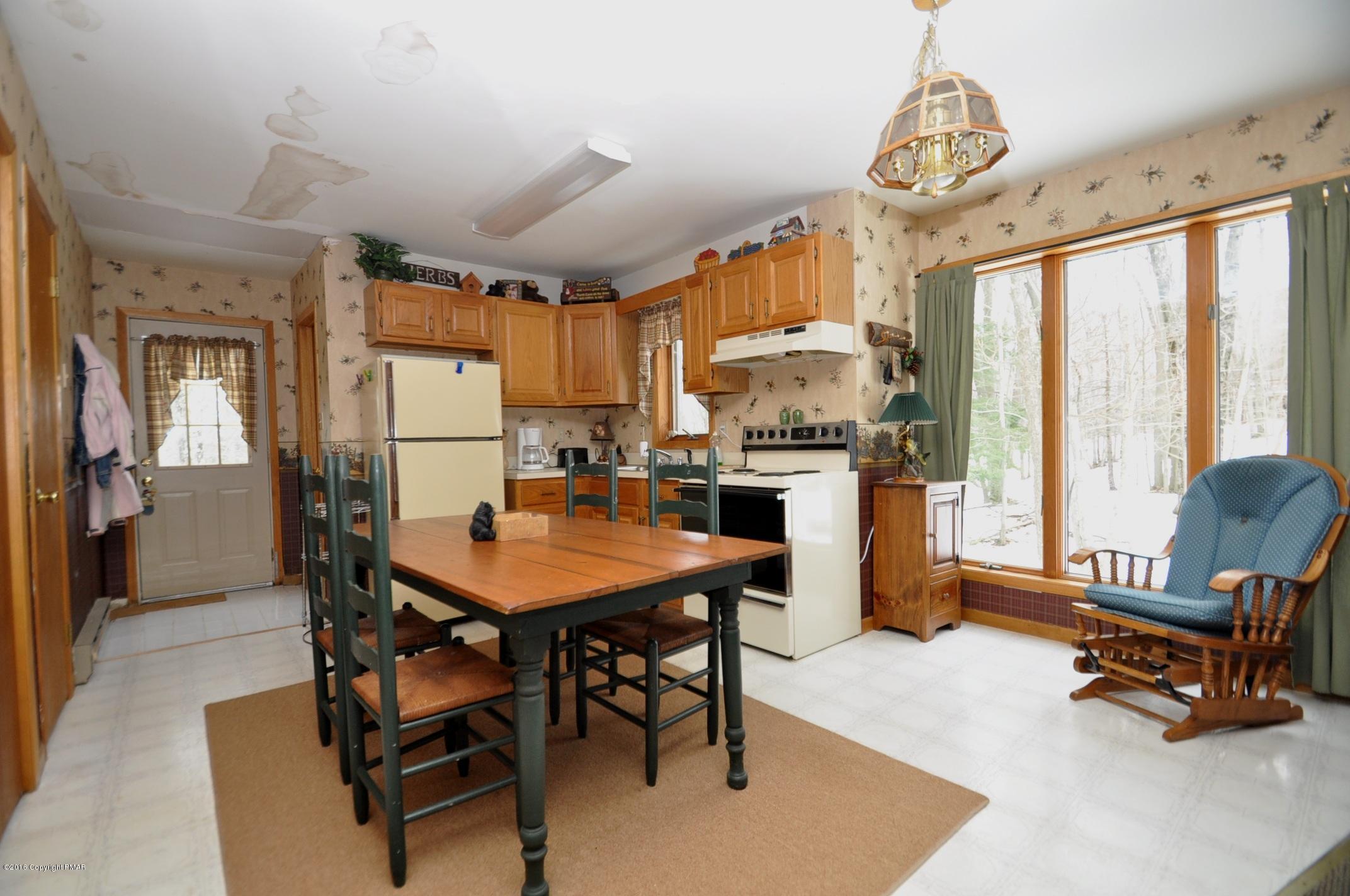 2 Brier Crest Road Blakeslee, PA 18610 - Photo 6 of 15 a view of a dining room with furniture window and wooden floor