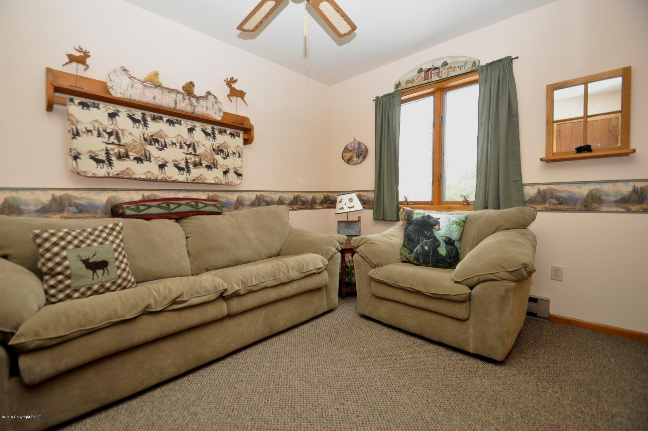 2 Brier Crest Road Blakeslee, PA 18610 - Photo 9 of 15 a living room with furniture and a large window