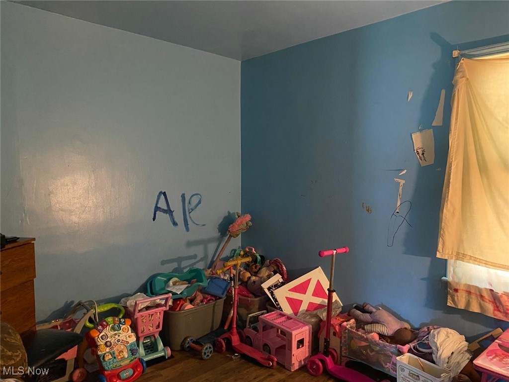 17011 Ridgeton Drive Cleveland, OH 44128 - Photo 15 of 35 Rec room with wood-type flooring
