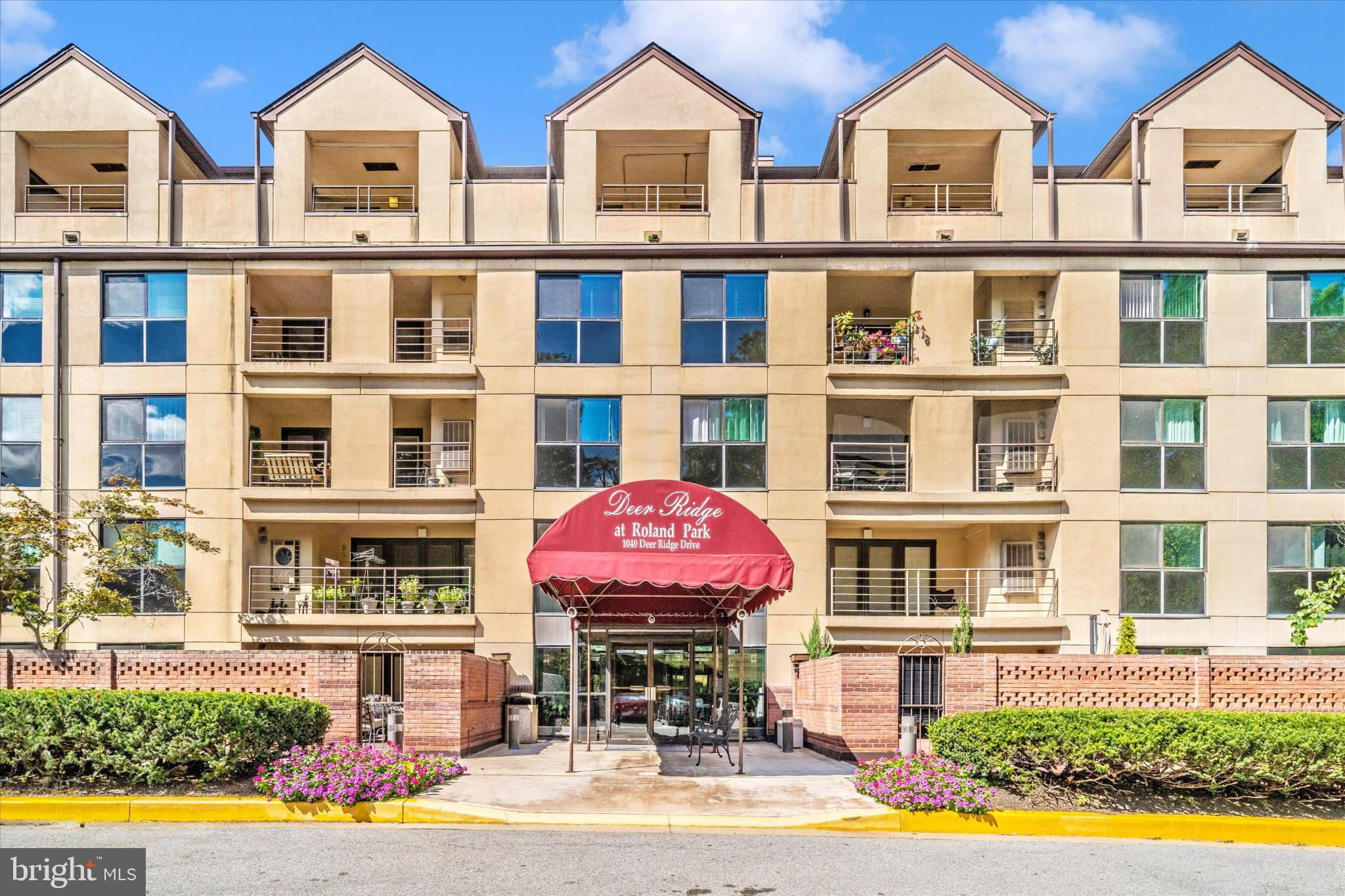 a front view of a multi story residential apartment building