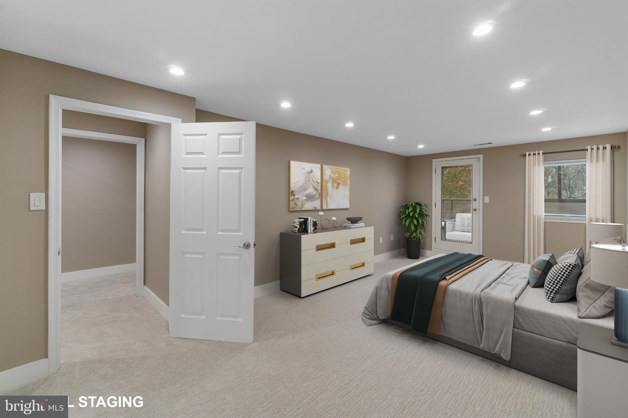 1040 Deer Ridge Drive, Unit 516 Baltimore, MD 21210 - Photo 20 of 33 Primary Bedroom with Balcony Access