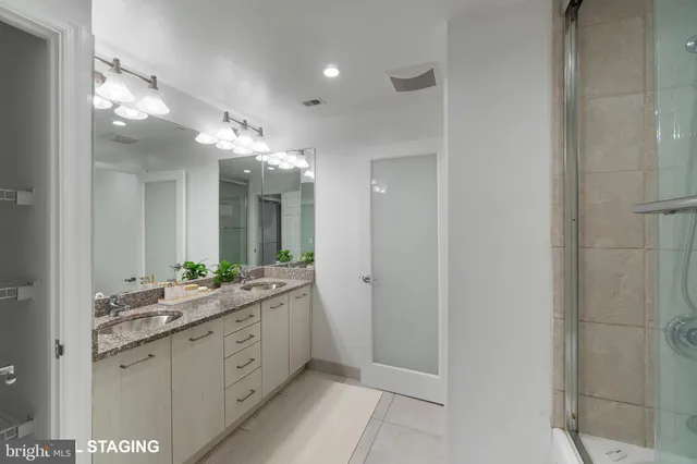 a view of a green field with lots of bushes