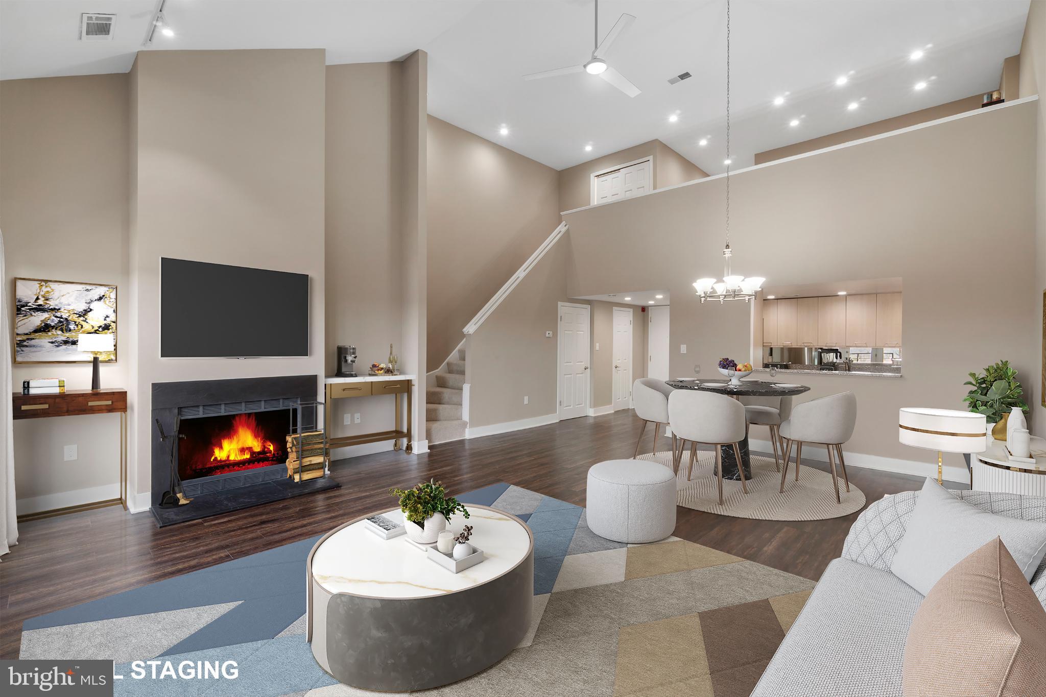 1040 Deer Ridge Drive, Unit 516 Baltimore, MD 21210 - Photo 9 of 33 Living/Dining Area with Wood Burning Fireplace