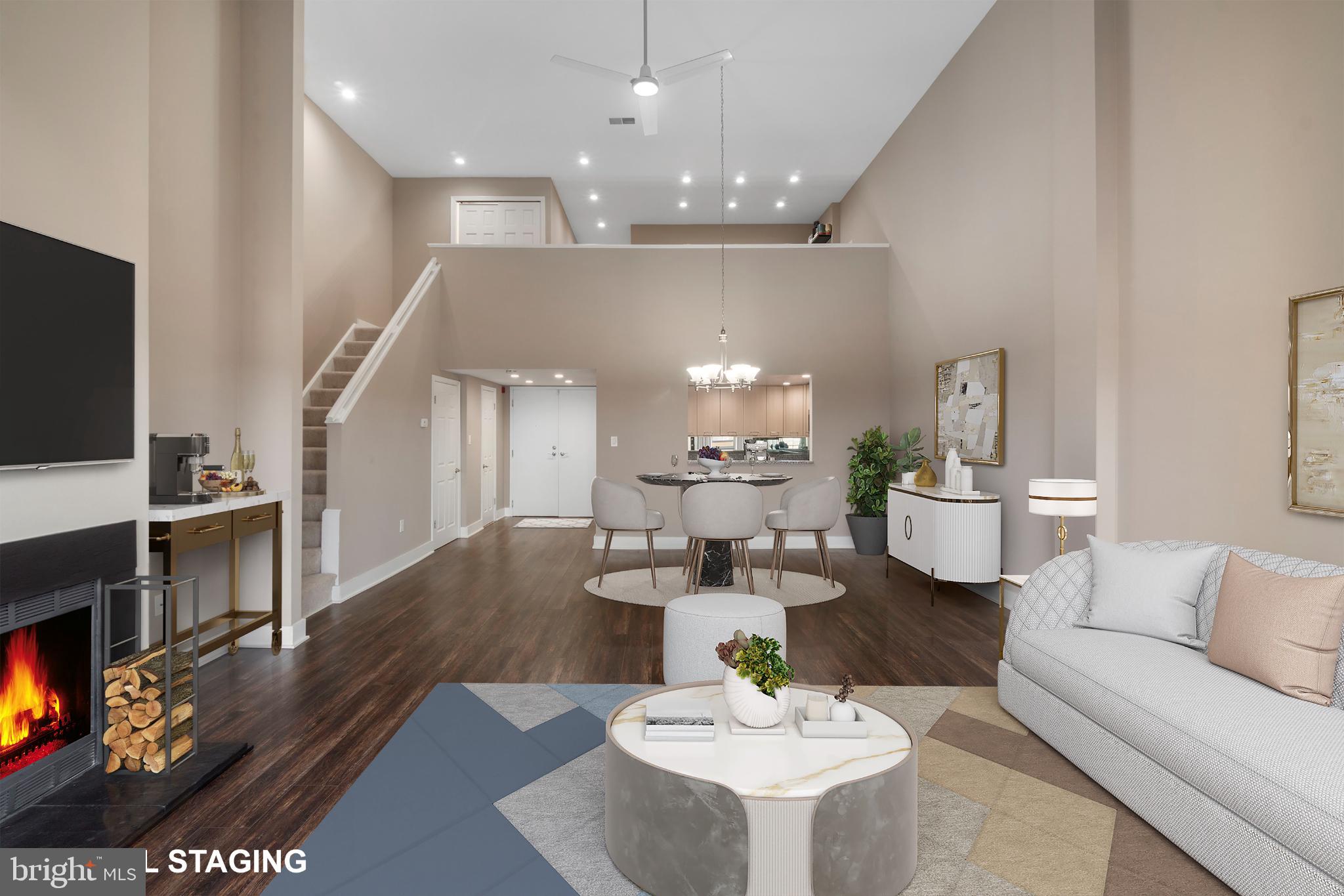 1040 Deer Ridge Drive, Unit 516 Baltimore, MD 21210 - Photo 10 of 33 Living/Dining Area with Wood Burning Fireplace