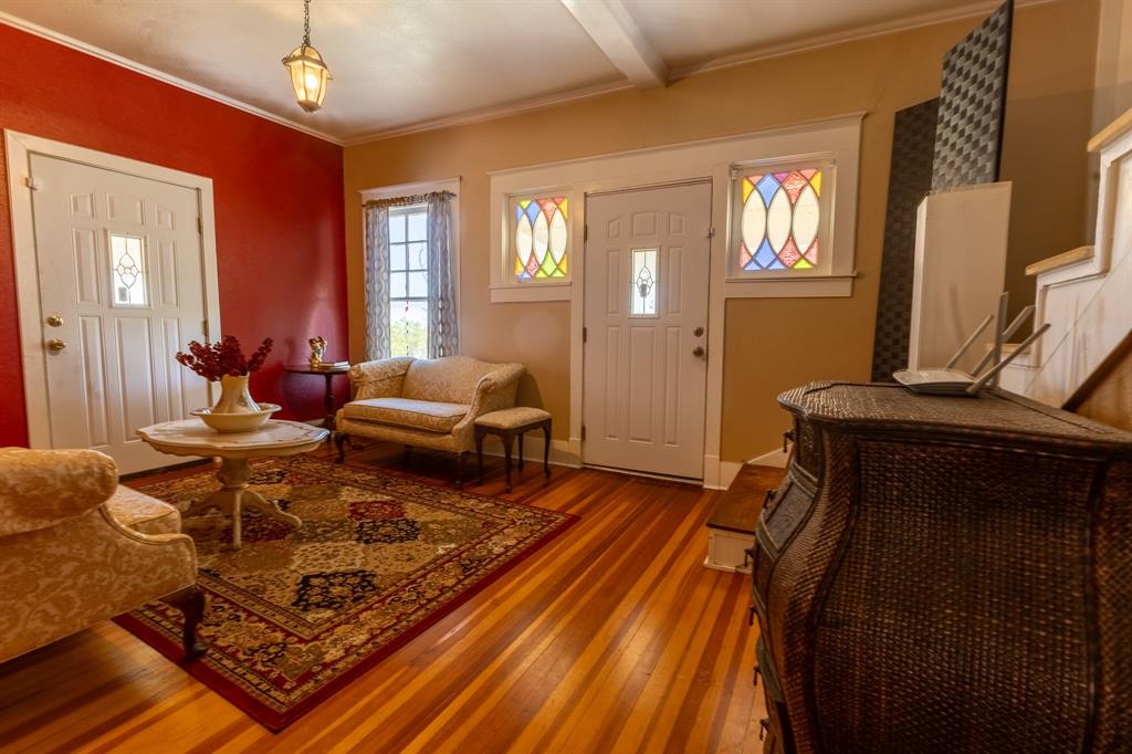 1115 Austin Street Coleman, TX 76834 - Photo 17 of 40 a living room with furniture rug and window