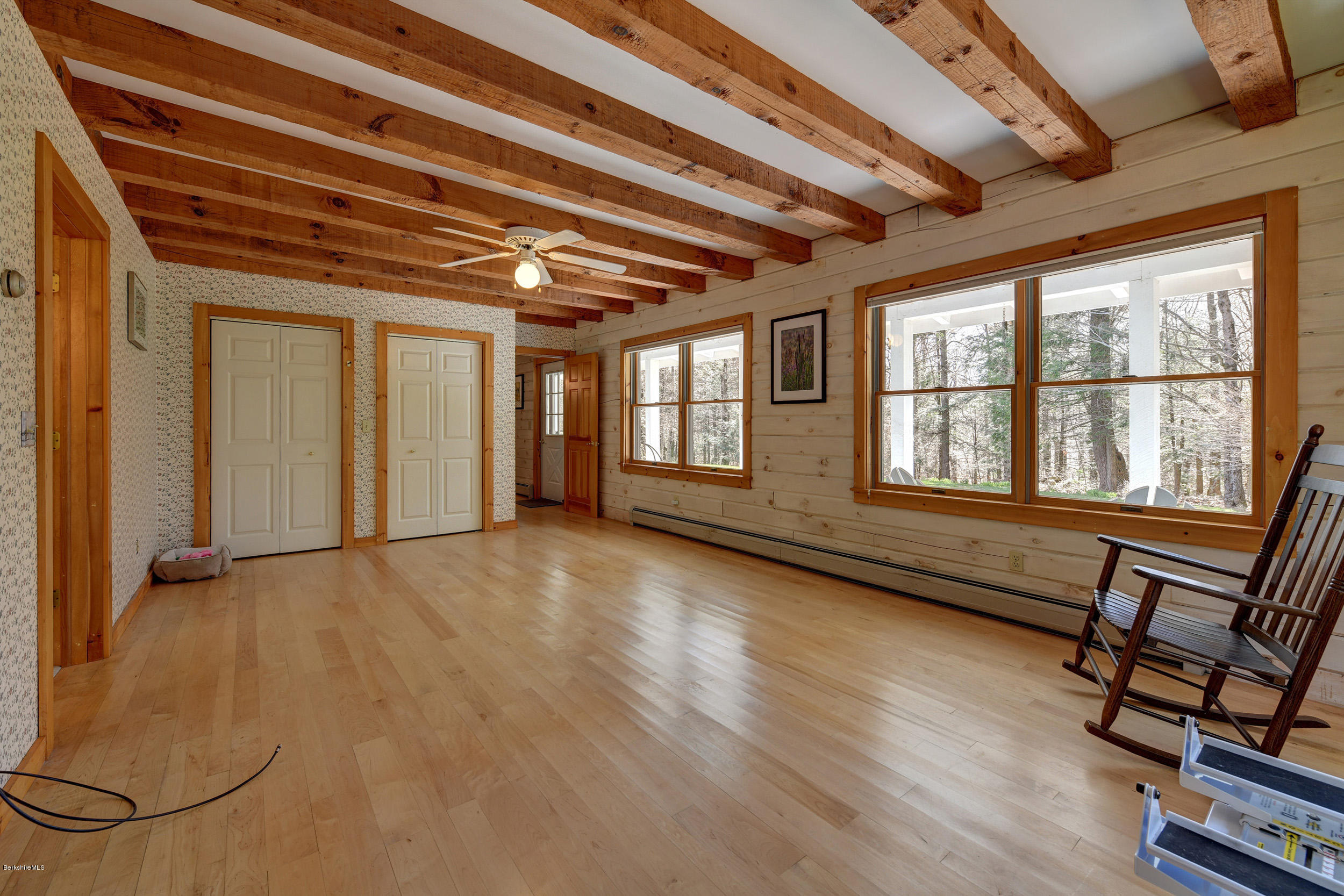 251 Captain Whitney Road Becket, MA 01223 - Photo 17 of 37 a view of an empty room with a window