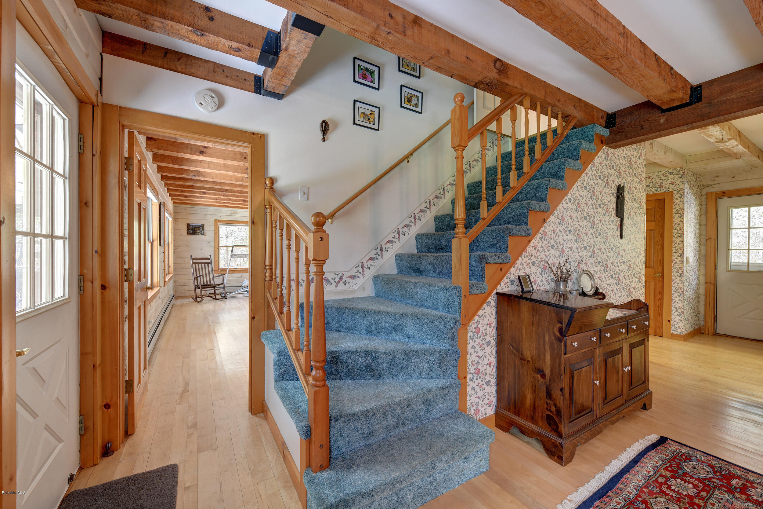 251 Captain Whitney Road Becket, MA 01223 - Photo 21 of 37 a view of an entryway wooden floor and a living room