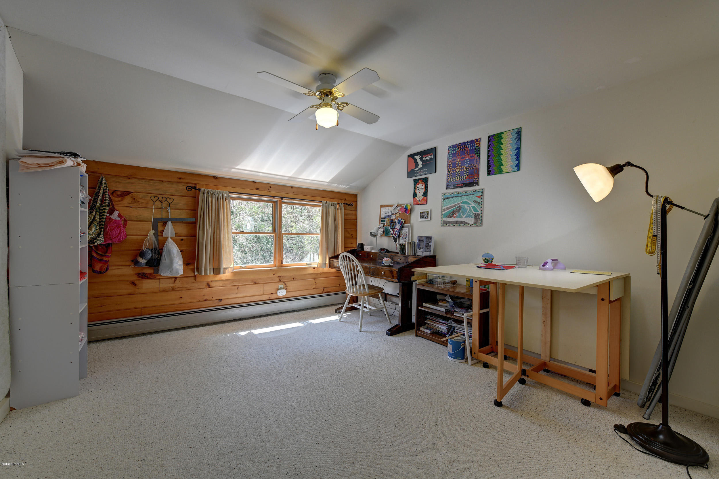 251 Captain Whitney Road Becket, MA 01223 - Photo 26 of 37 a view of a livingroom with furniture and a ceiling fan
