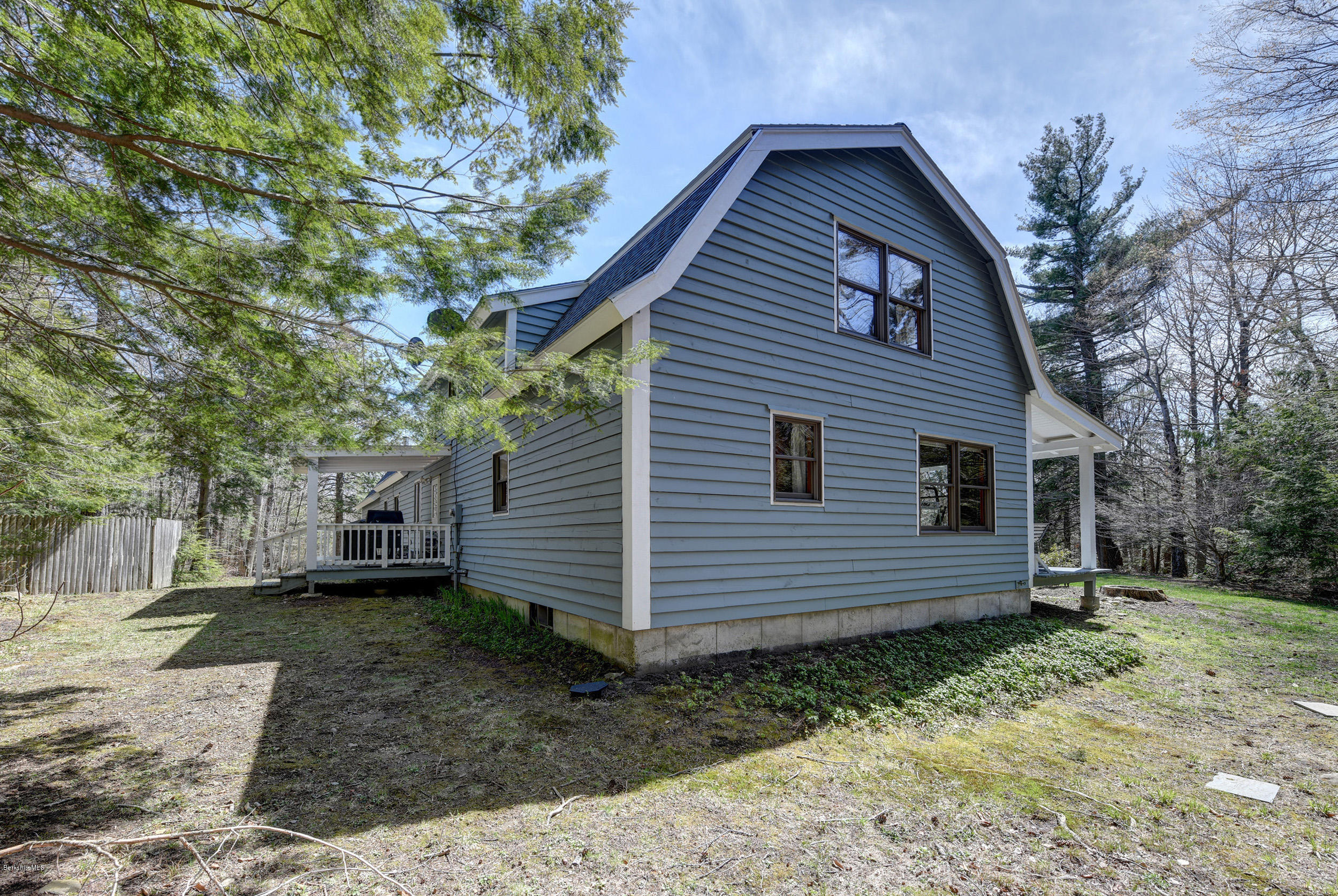 251 Captain Whitney Road Becket, MA 01223 - Photo 33 of 37 a view of a house with a yard