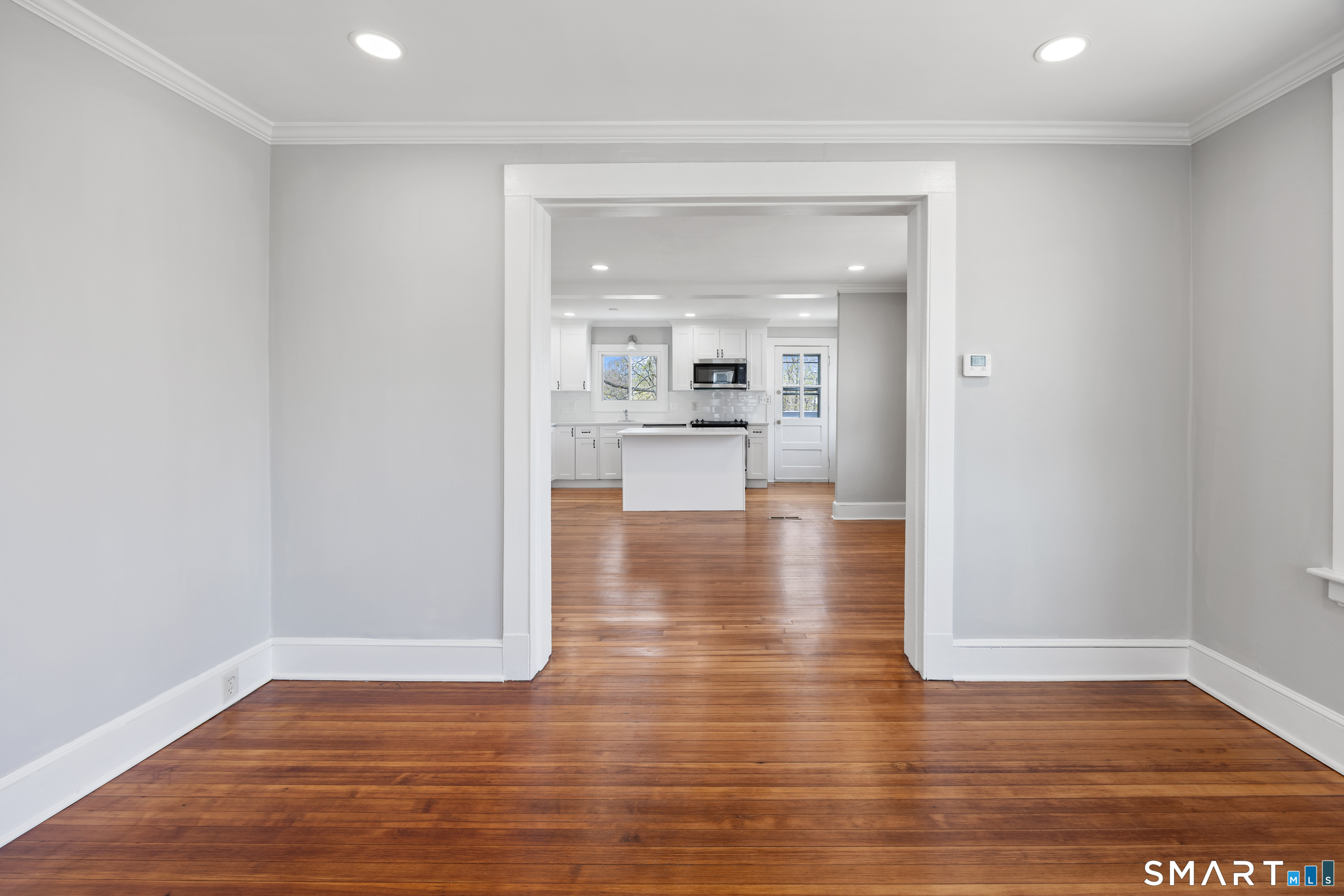 22 Merrimac Street Watertown, CT 06779 - Photo 5 of 17 a view of a kitchen cabinets and wooden floor