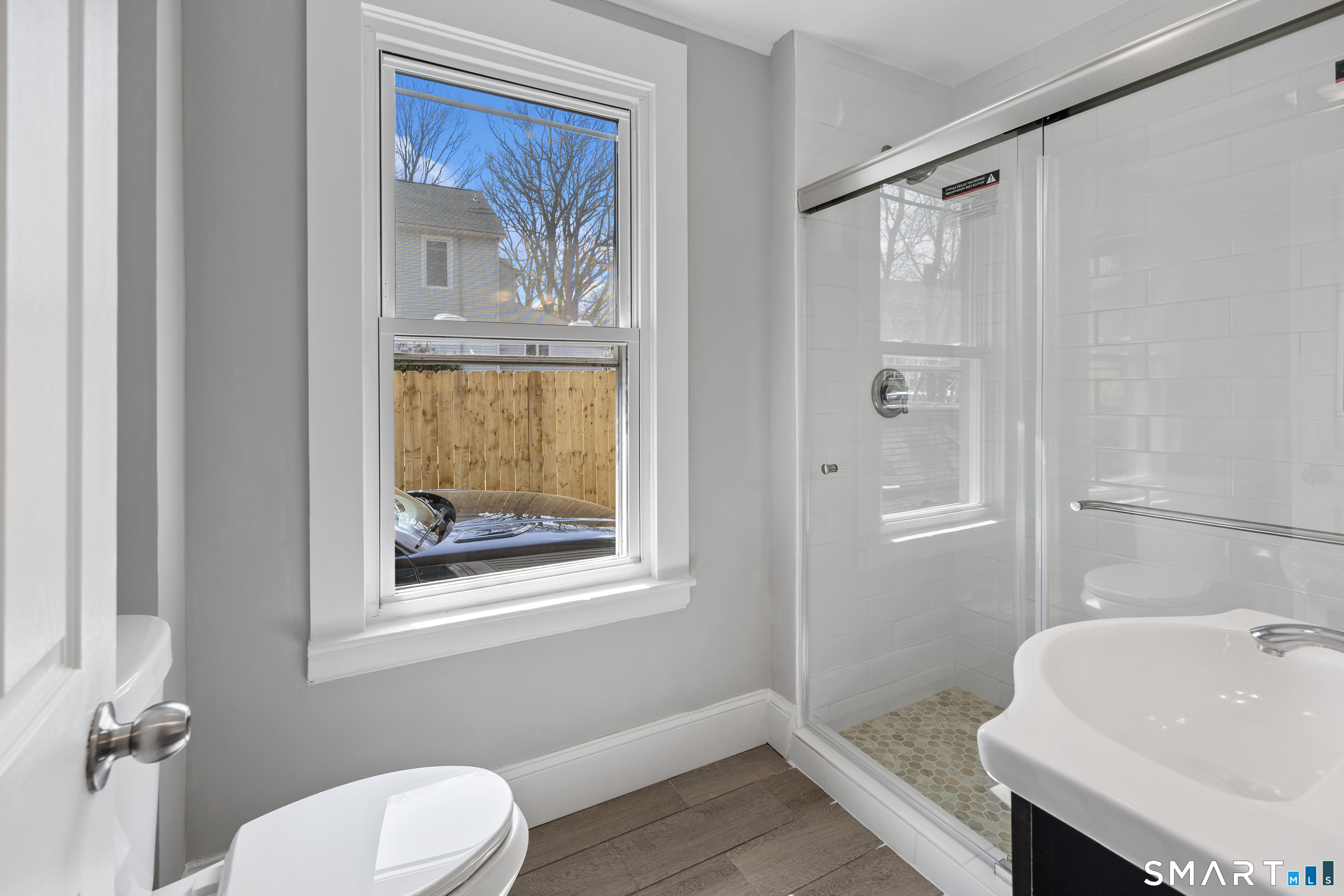 22 Merrimac Street Watertown, CT 06779 - Photo 7 of 17 a bathroom with a sink and a mirror