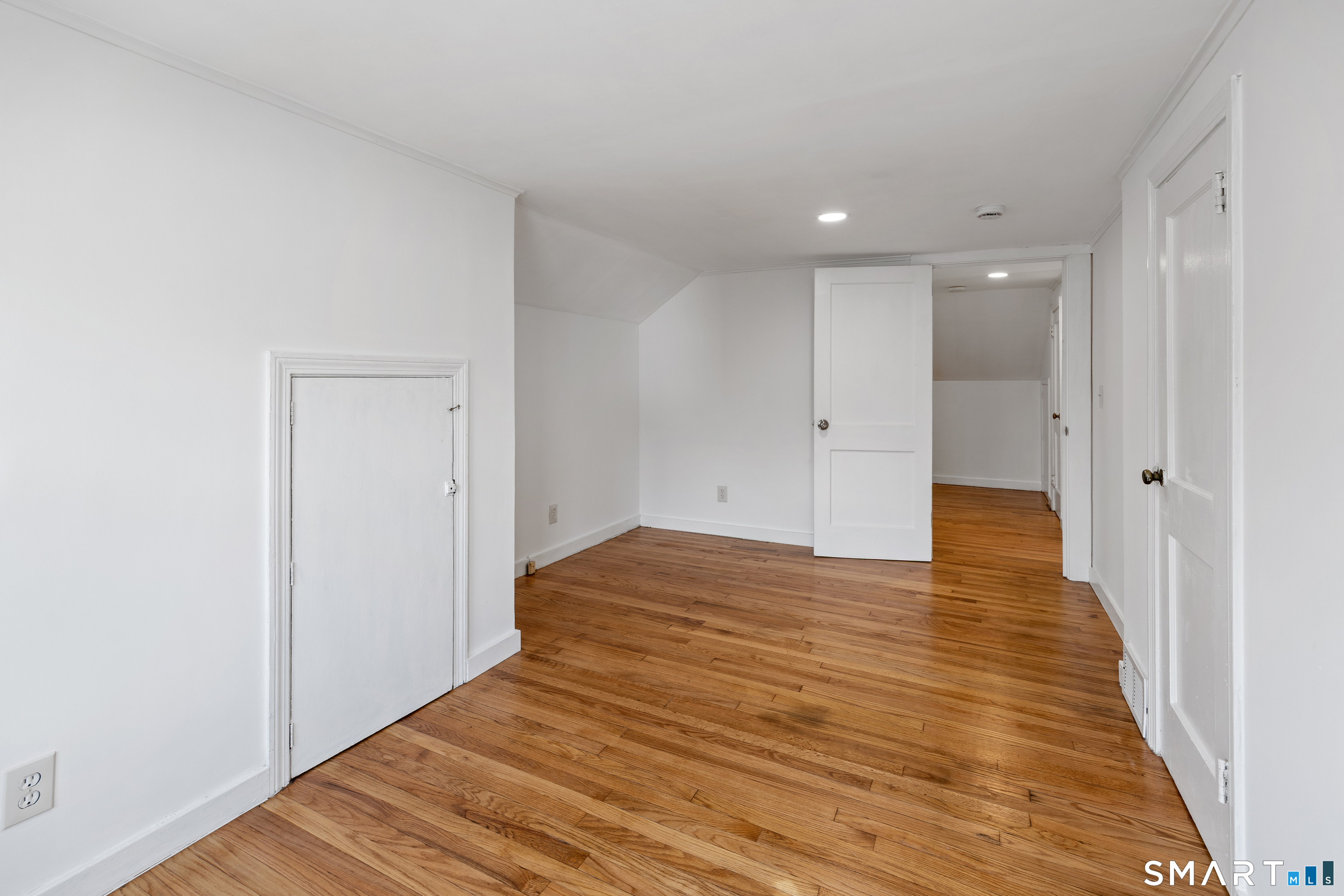 22 Merrimac Street Watertown, CT 06779 - Photo 10 of 17 a view of empty room with wooden floor