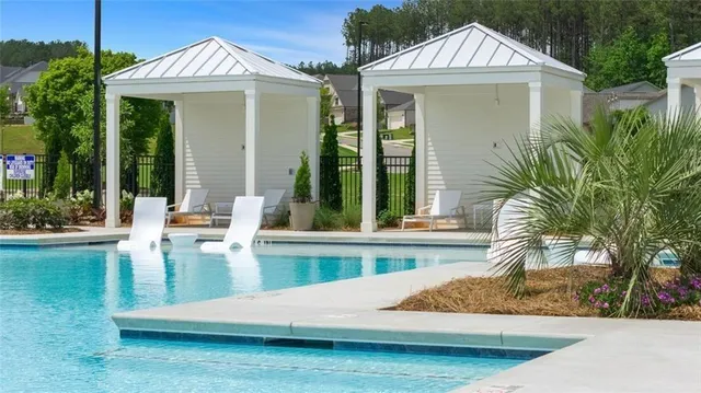 a black and white photo of a living room