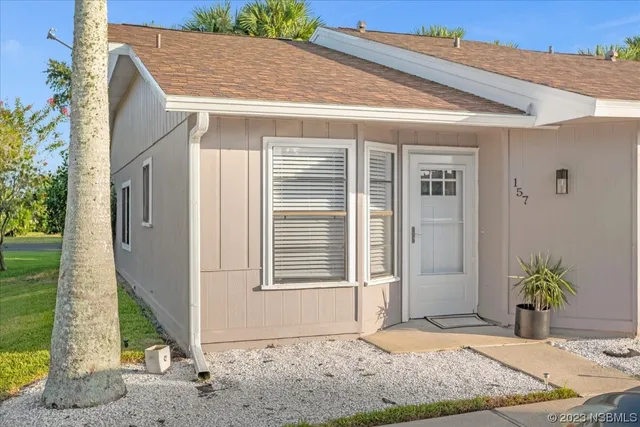 a kitchen with sink cabinets and window