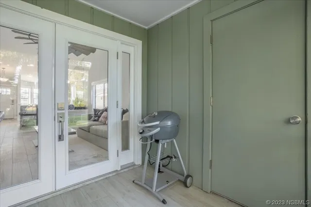 an aerial view of a house with a lake view