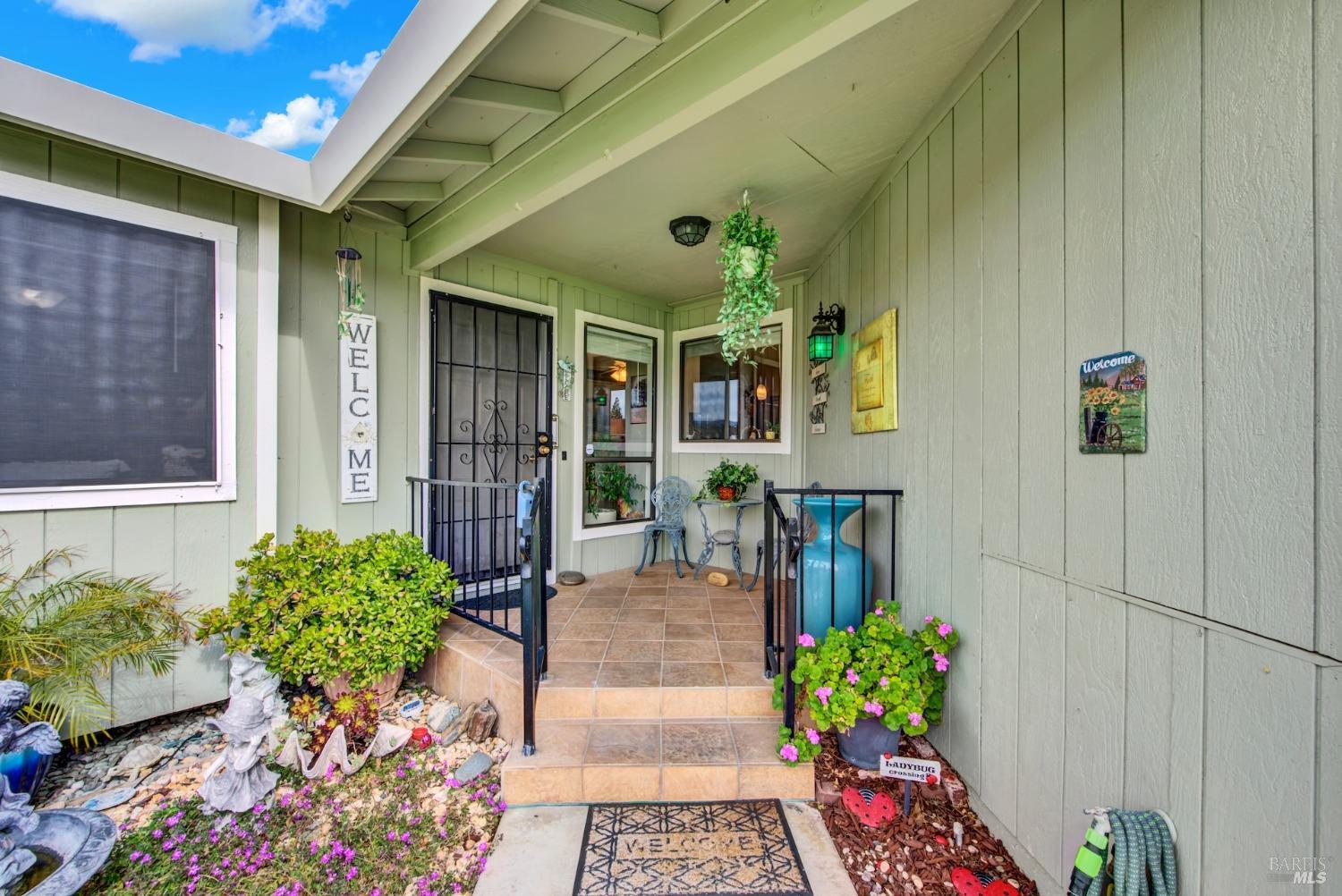 169 Bryce Way Vacaville, CA 95687 - Photo 1 of 1 a lobby with furniture and flowers