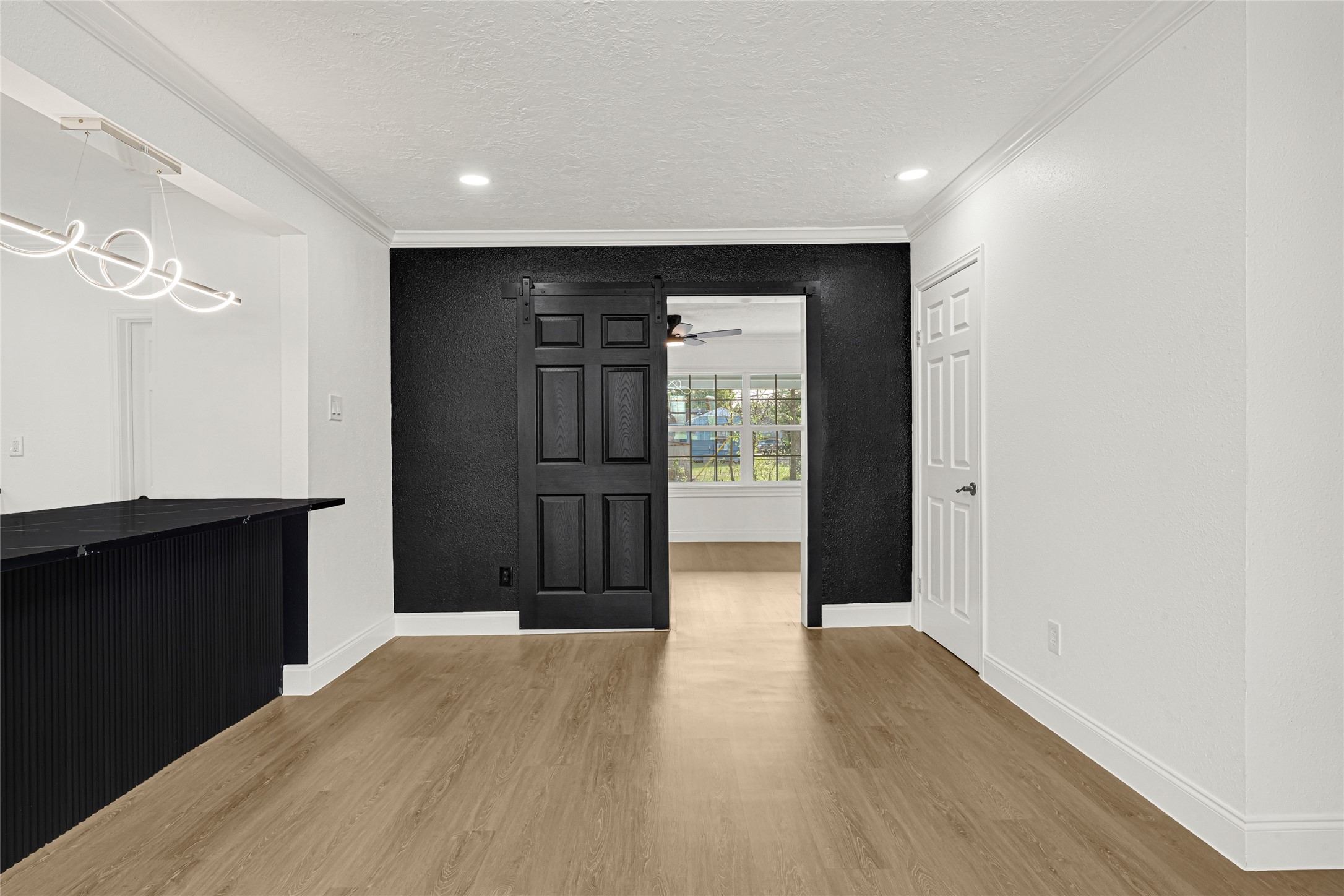 513 Main Street Pasadena, TX 77506 - Photo 12 of 35 a view of entryway with wooden floor