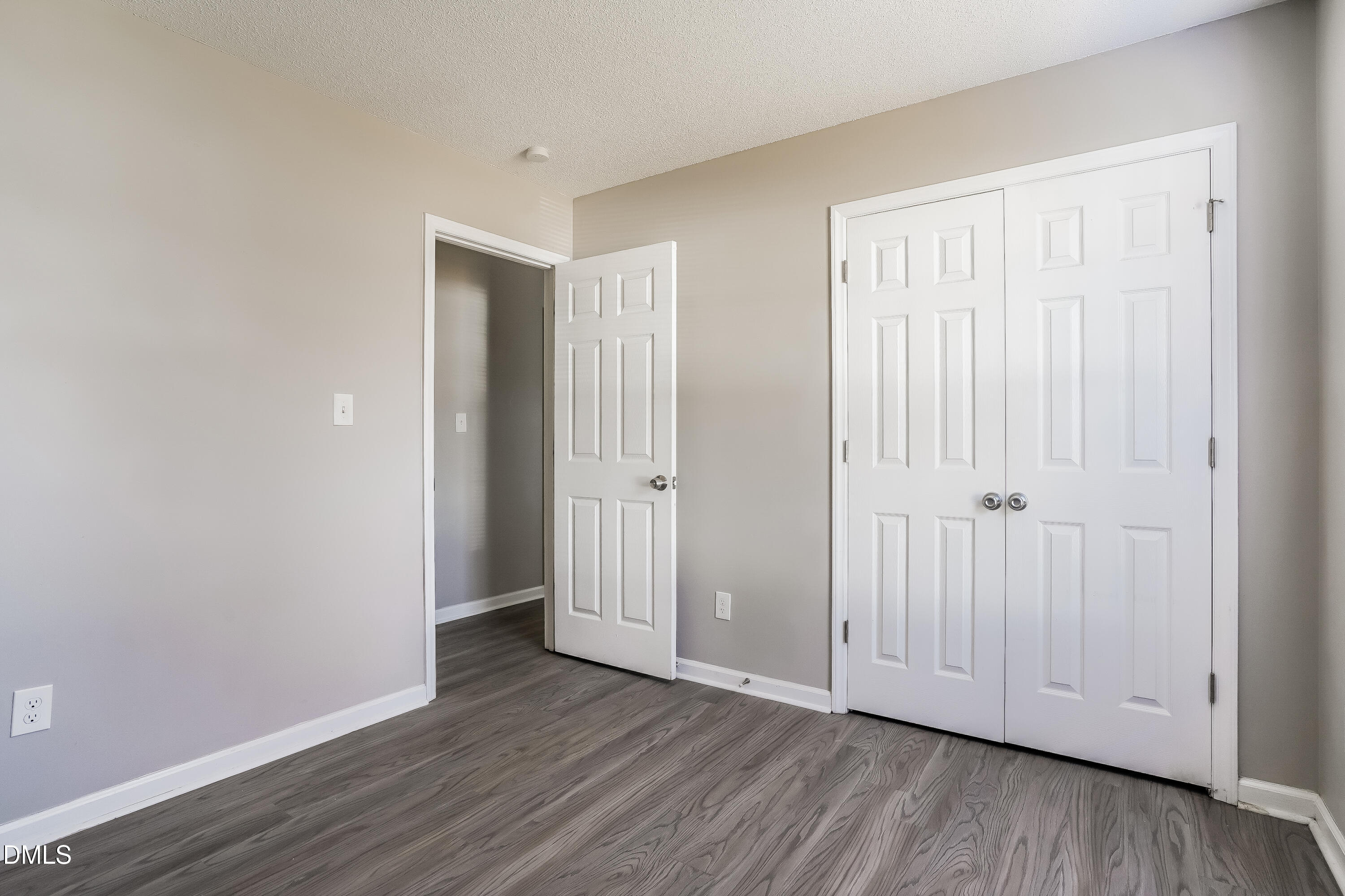 1410 Mandolin Place Zebulon, NC 27597 - Photo 14 of 16 a view of a livingroom with wooden floor